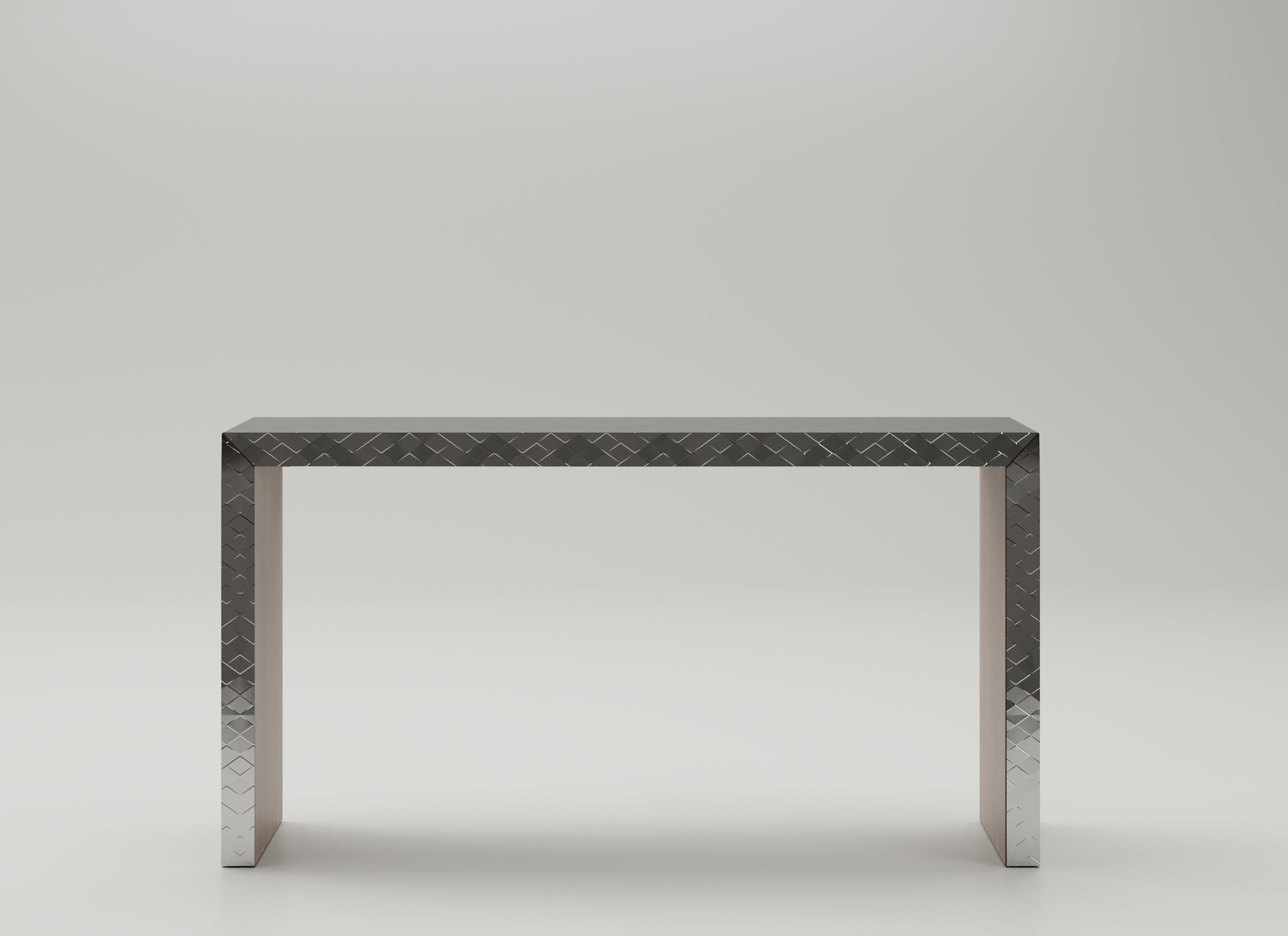 Optical Console by Andrea Bonini
Limited Edition
Dimensions: D 35 x W 135 x H 80 cm.
Materials: Steel with Diamante effect and Canaletto walnut wood.
Finish: Silver galvanic metal and matte wood.
Limited series, numbered and signed pieces. Custom