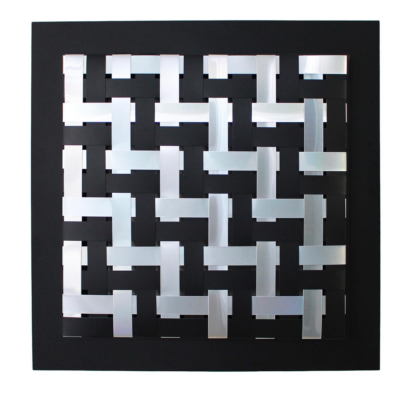 An extraordinary piece of op art, this wall decor by Splot Design will make for a bold and iconic addition to a contemporary interior. Eclectic and singular, it exudes a sophisticated vintage allure. Handmade of metal, it can be hung in any