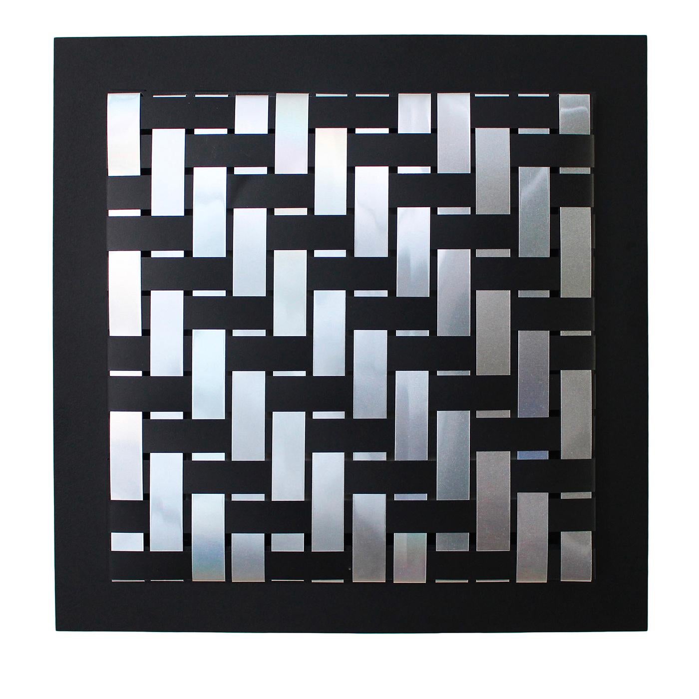 Inspired by optical art (op art), this wall decor is an extraordinary artwork by Splot Design, to display in a refined and contemporary interior. Eclectic, powerful, and bold, it is a singular piece of sophisticated vintage allure. Handmade of