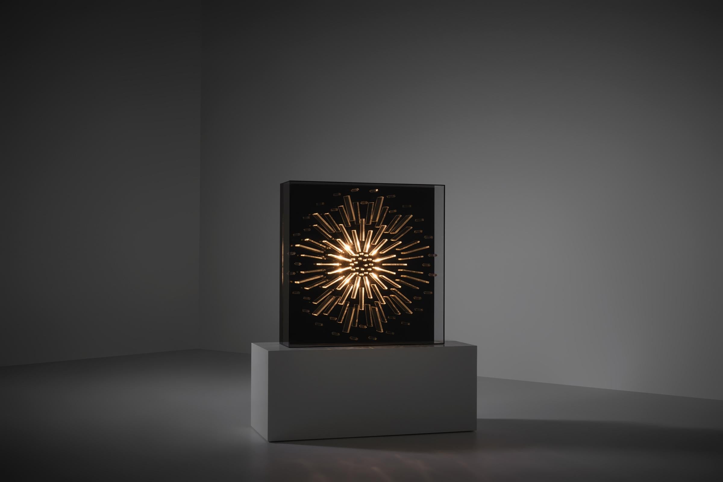 Unique optical methacrylate light sculpture, France 1970s. Wonderful dimensional light sculpture composed of multiple methacrylate pieces, the pieces are dynamically positioned in a sunburst pattern and are gets lower in a bowl shape to the center