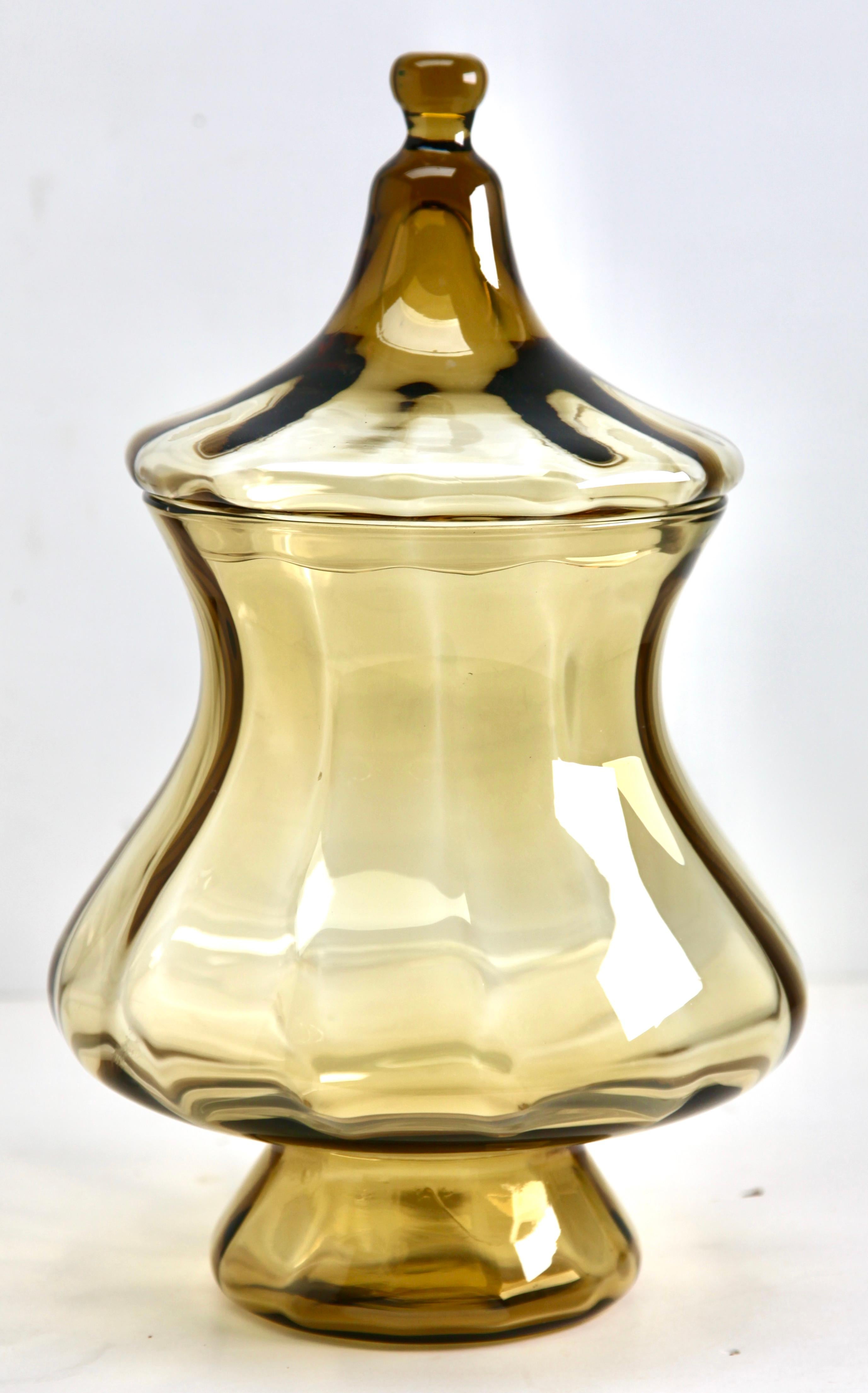 Large optical ribs glass jar with lid in the style of Empoli
In very good condition.







