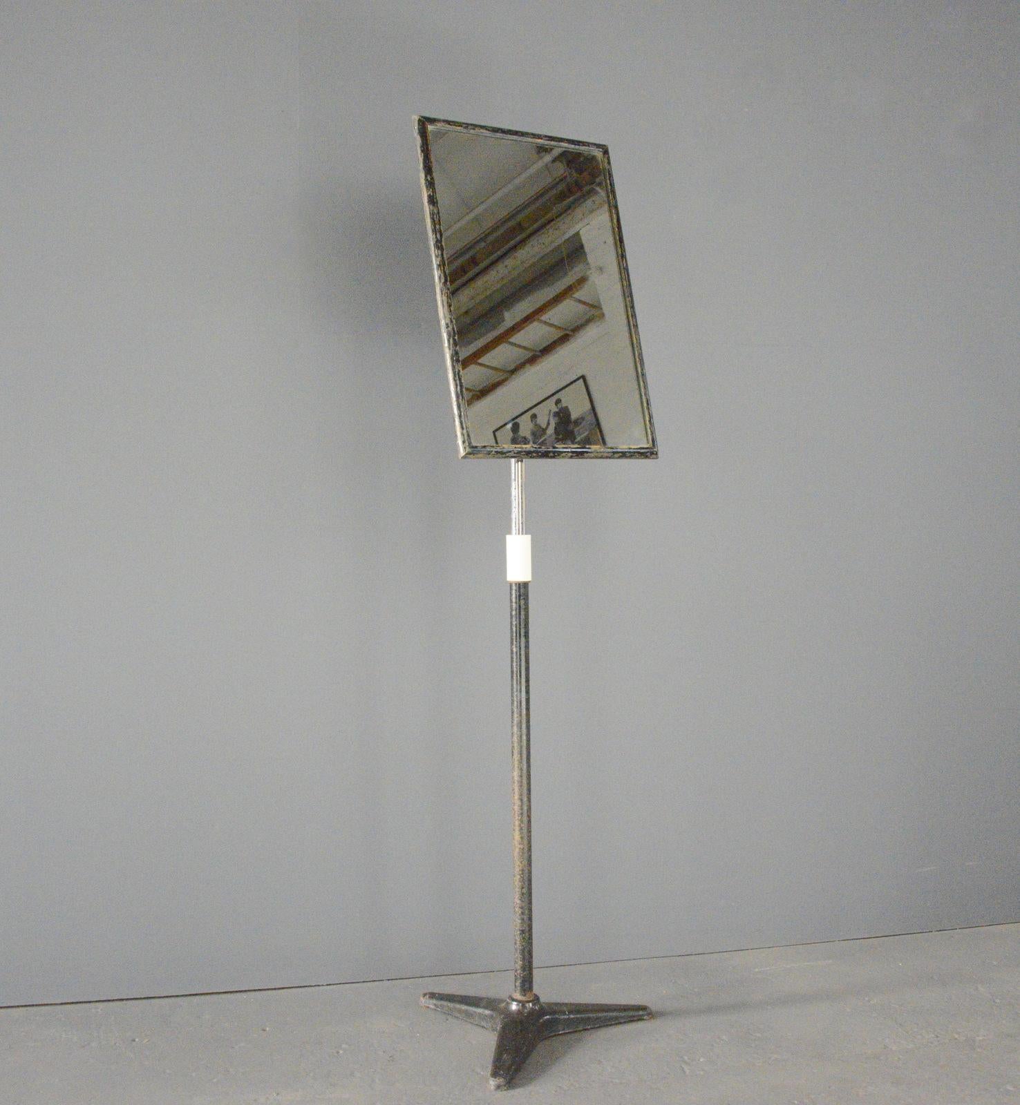 Opticians Shop Mirror Circa 1930s

- Cast iron base
- Ebonized wooden frame 
- Nickel plated stem
- Telescopic/ height adjustable
- English ~ 1930s
- 38cm wide x 160cm tall at full extension

Condition Report

Some patina to the wooden frame
