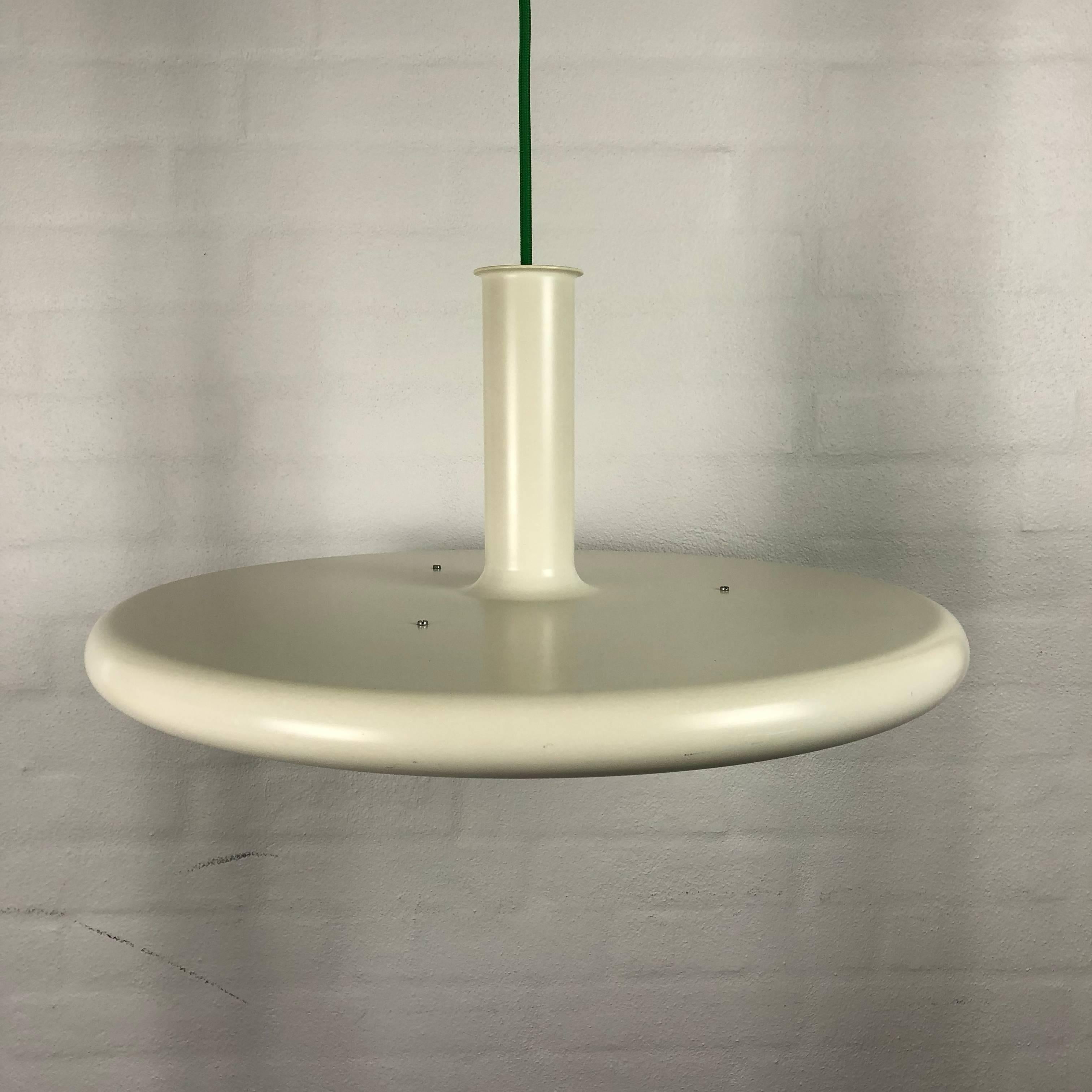 A beautiful Danish vintage piece of history. The design is with clear elements from Space Age, and the design is created to last.
It will look very nice in most modern homes.

The light is very beautiful, and if you use a silver-bottom light