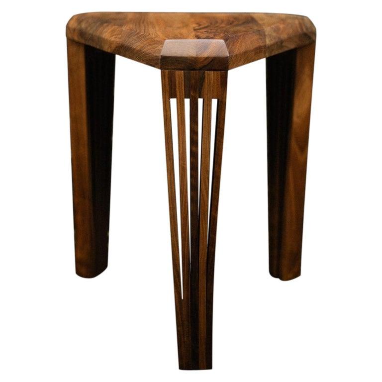 Optique side table, stool by Albert Potgieter Designs
Dimensions: Ø 40 x H 45 cm. 
Materials: Wanut and Mahogany.

Our Optique stool / side table was designed to really highlight the wooden leg design that makes the Optique pieces so unique.