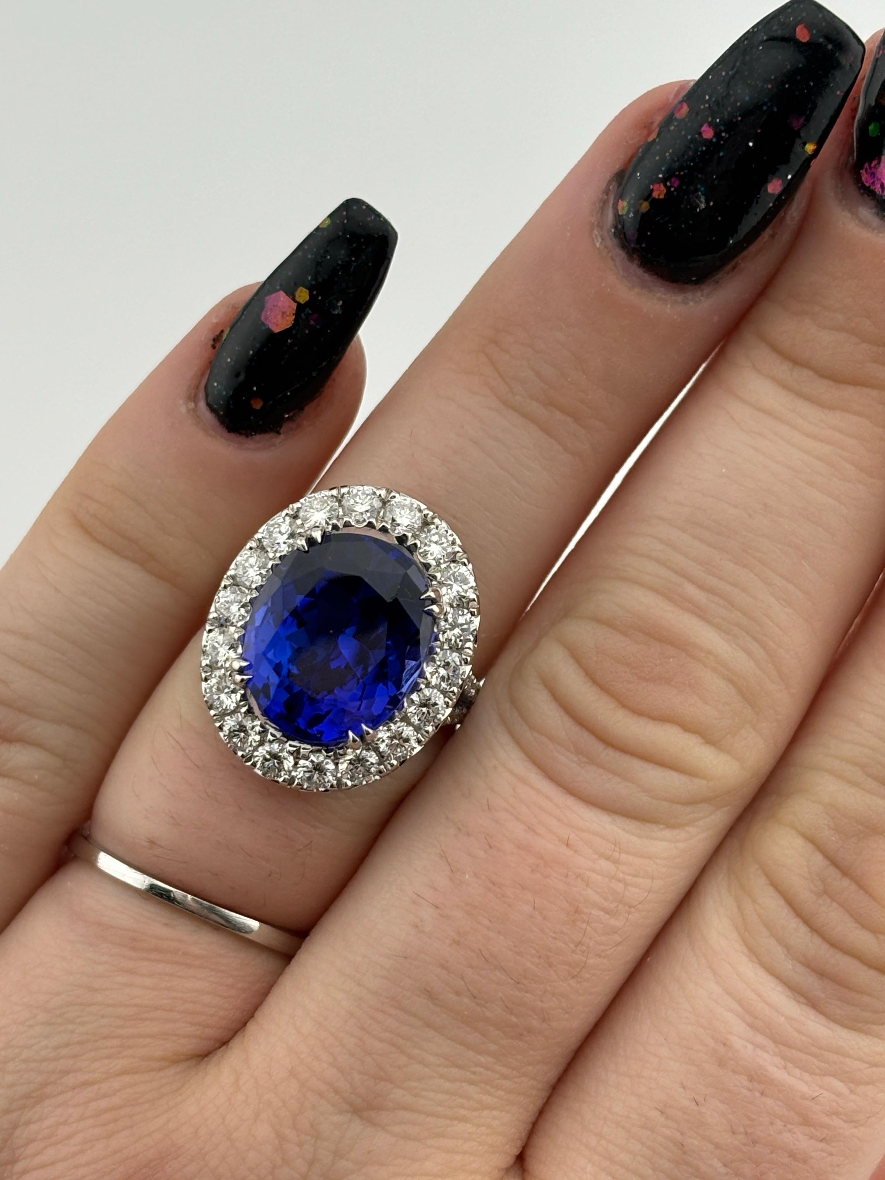 Women's or Men's Opulent 18k White Gold Tanzanite & Diamond Halo Cocktail Ring For Sale