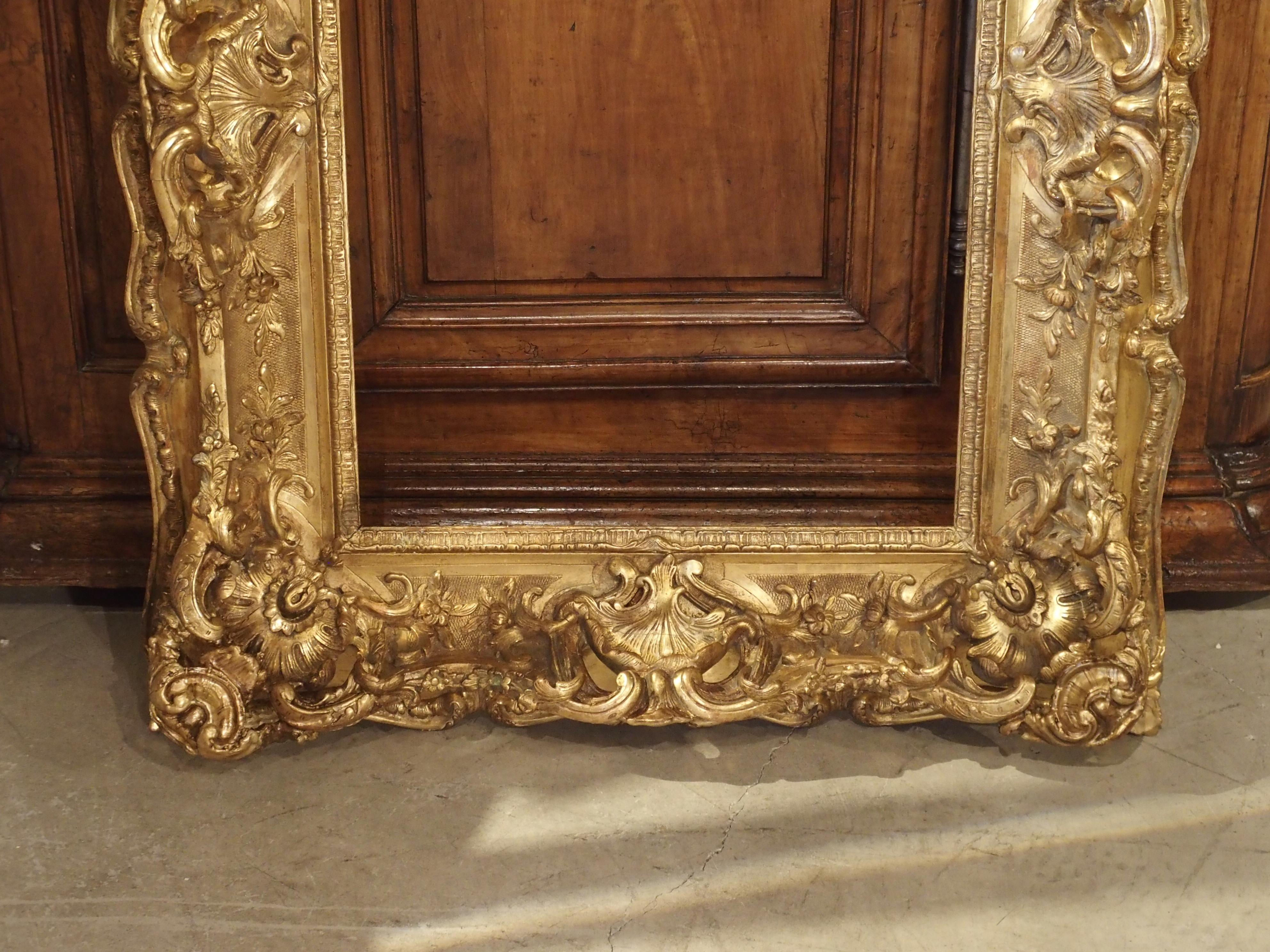 Opulent 19th Century French Louis XV Style Gold Leaf, Giltwood and Plaster Frame 10