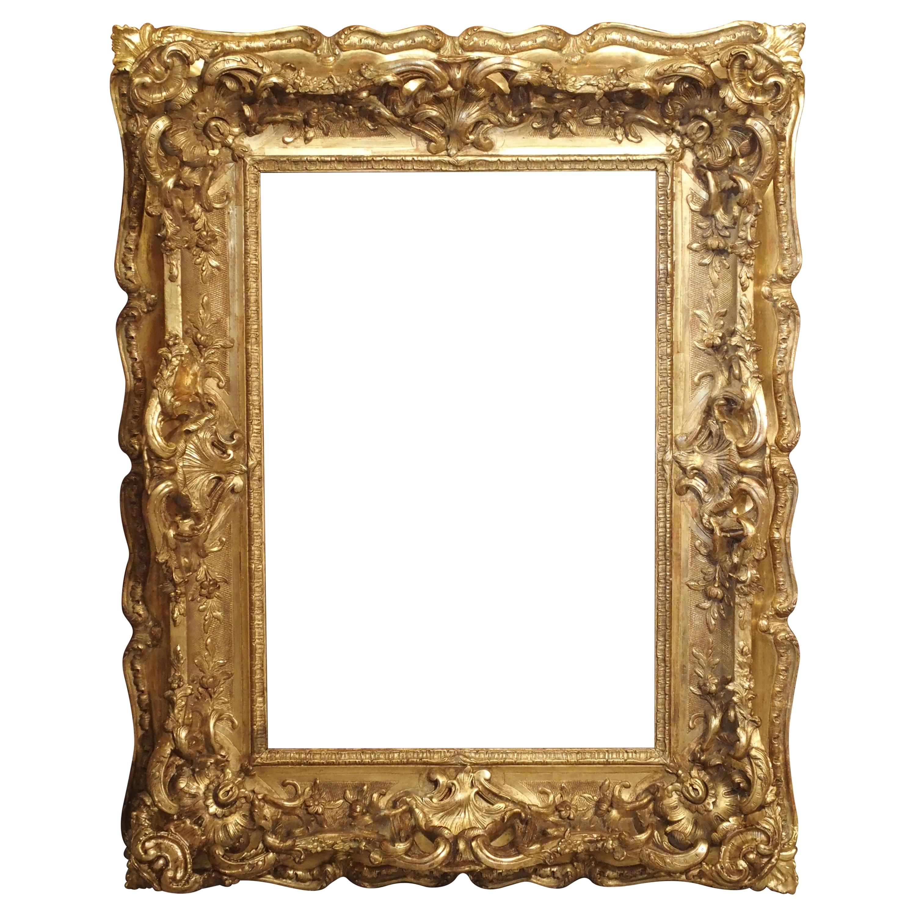 Opulent 19th Century French Louis XV Style Gold Leaf, Giltwood and Plaster Frame