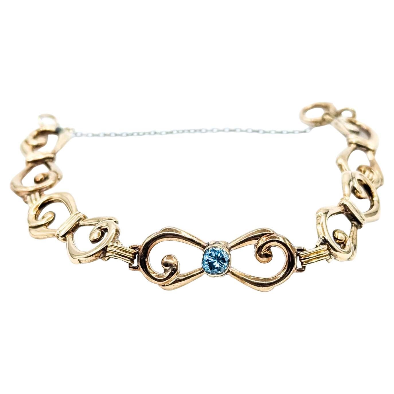 Opulent Blue Zircon 10k Gold Fancy Link Bracelet