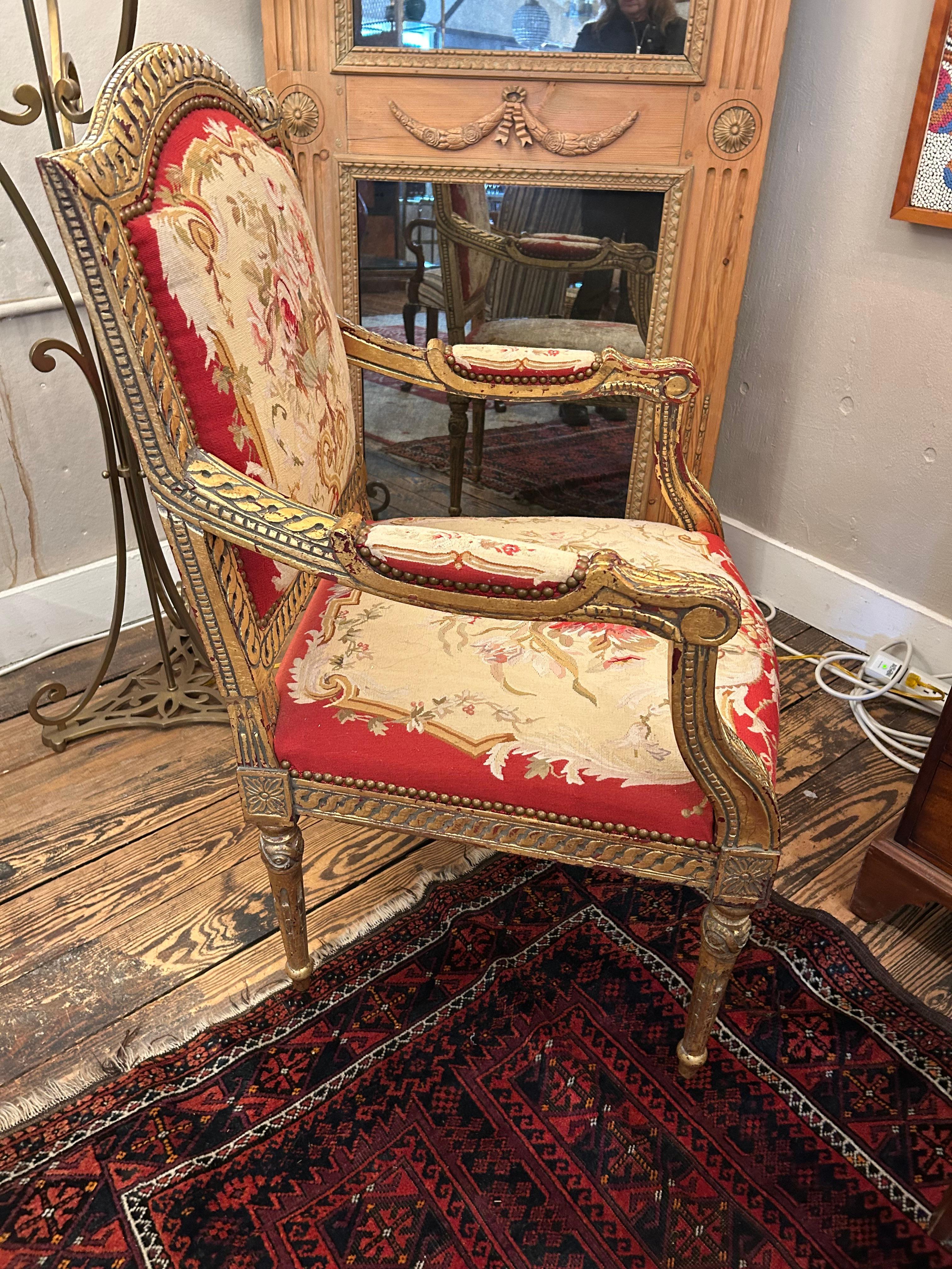 Show stopper opulent reproduction Louis XV giltwood arm chair upholstered in mouthwatering tapestry.
Arm height 27”
TS