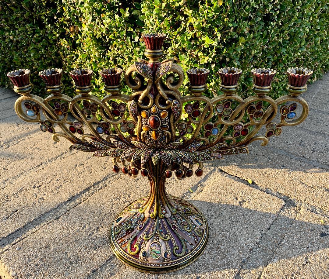Magnificent, extremely opulent, large Hanukkah or chanukiah or hanukkiah Menorah candelabra or candelabrum from the Jay Strongwater “Jewels for the Home” collection has an exquisite, colorful floral motif and holds 9 candles. It is an exquisite