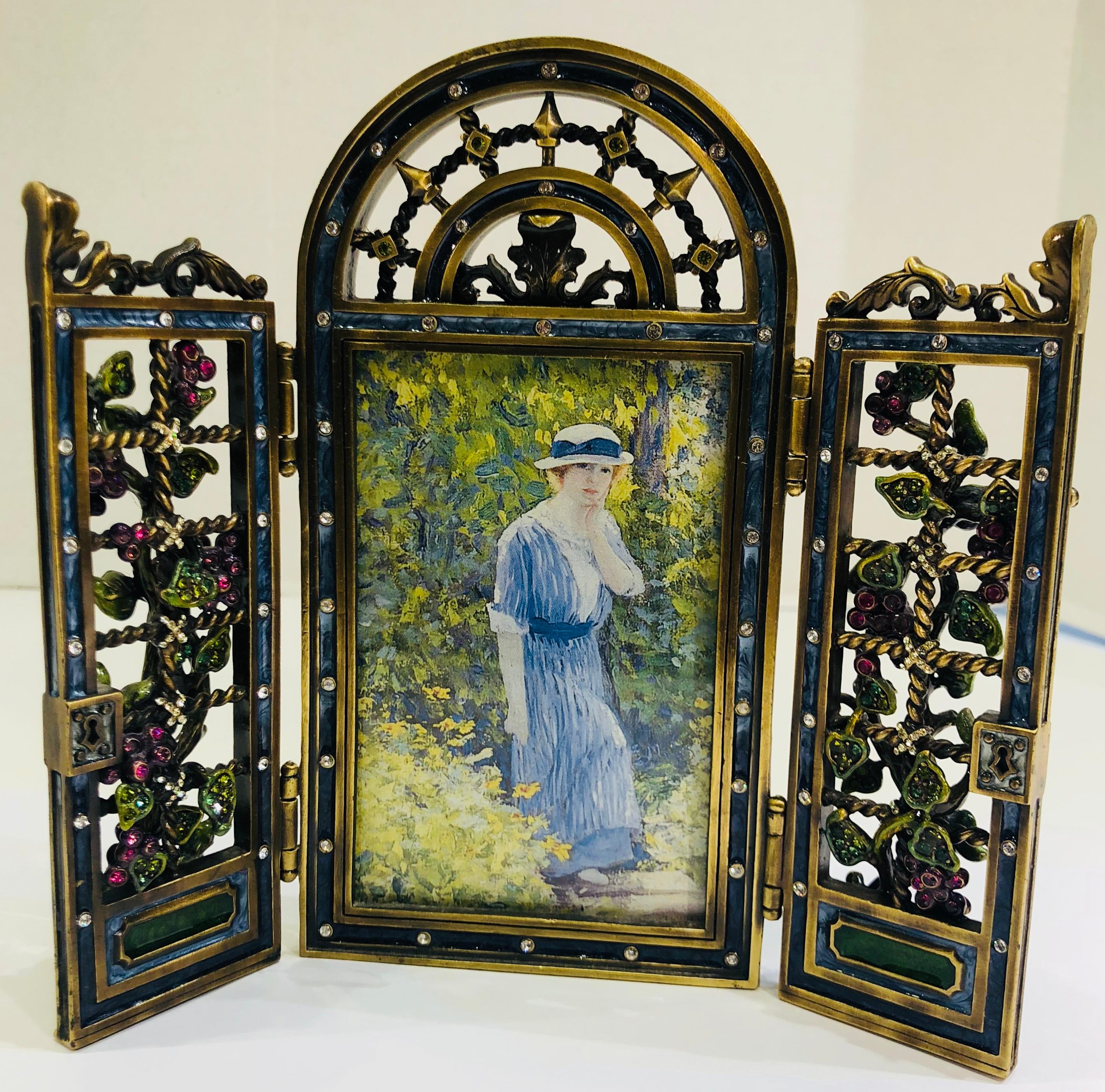 Rare, hard-to-find, estate, retired designer, Jay Strongwater English Garden motif picture frame holds a 3
