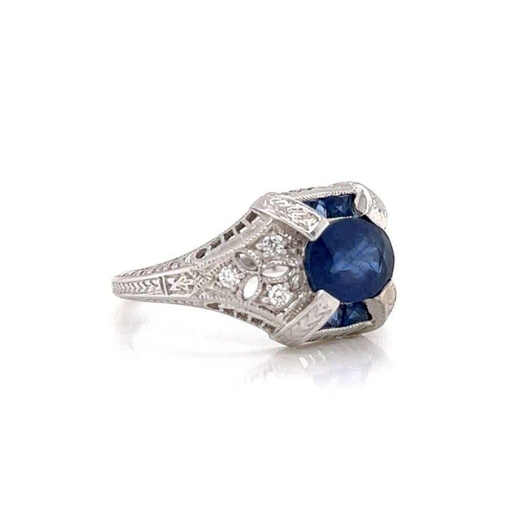 Opulent Sapphire and Diamond Ring

This oval sapphire and diamond vintage inspired ring is perfect for any occasion.  With its fine vibrant blue sapphire center oval, surrounded by french cut sapphires and diamonds this even makes for the perfect