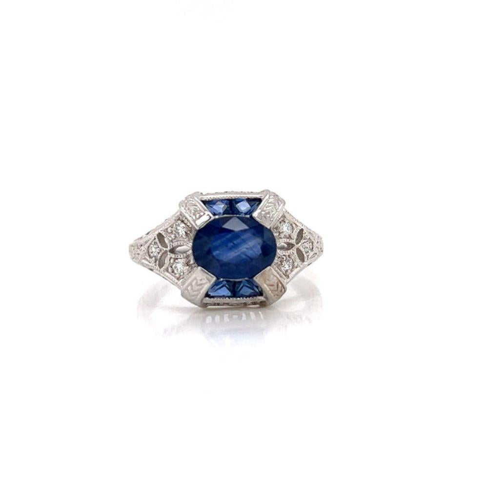 Round Cut Opulent Sapphire and Diamond Ring