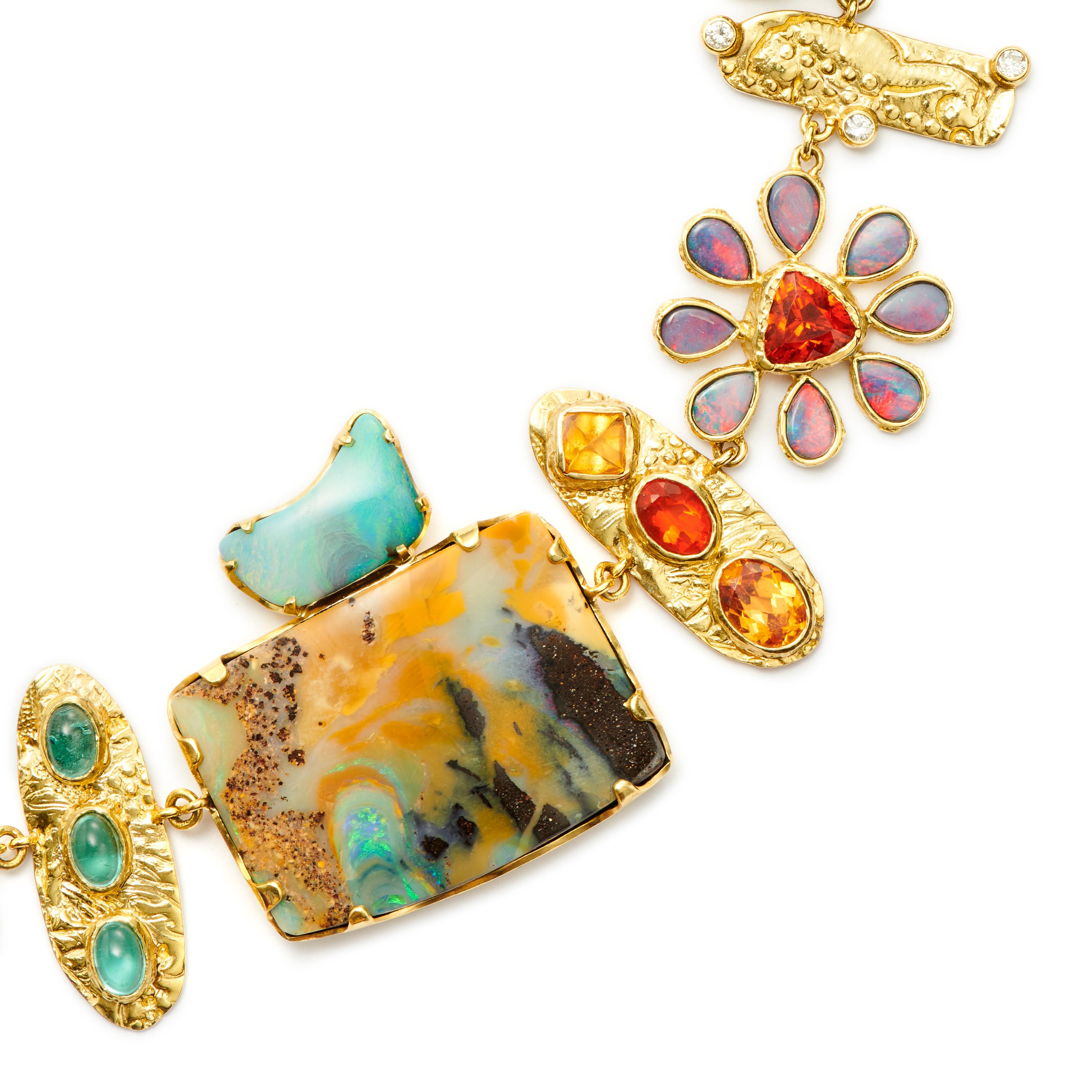 The dramatic and whimsical Opus 1 necklace, set in 18 Karat Gold, is aptly named, as it is truly a work of art. This exquisitely crafted collar features:

Australian Boulder Opal: 256.3 Carat

Ethiopian Opal: 1.83 Carat

Orange, Pink and Purple