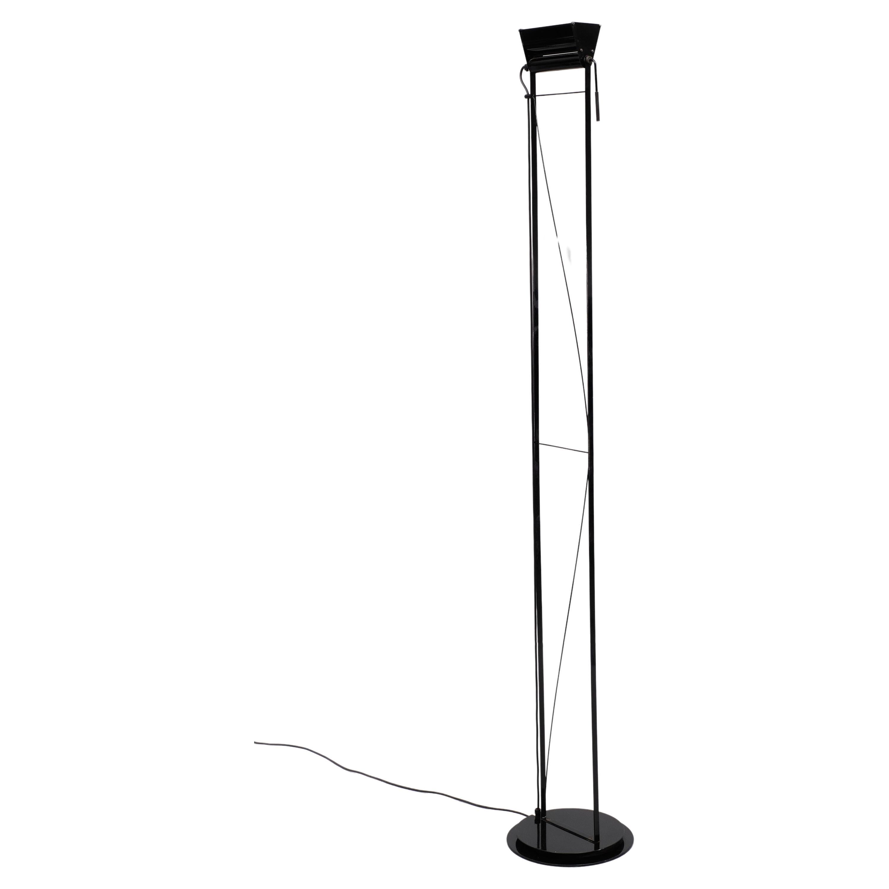 The Lumina Opus is a sleek and simple floor standing uplight with metal structure for indirect light with adjustable diffuser; dimmer on the cable: the free length of the wire can be winded in a special housing in the base. Dimmer on the cable.