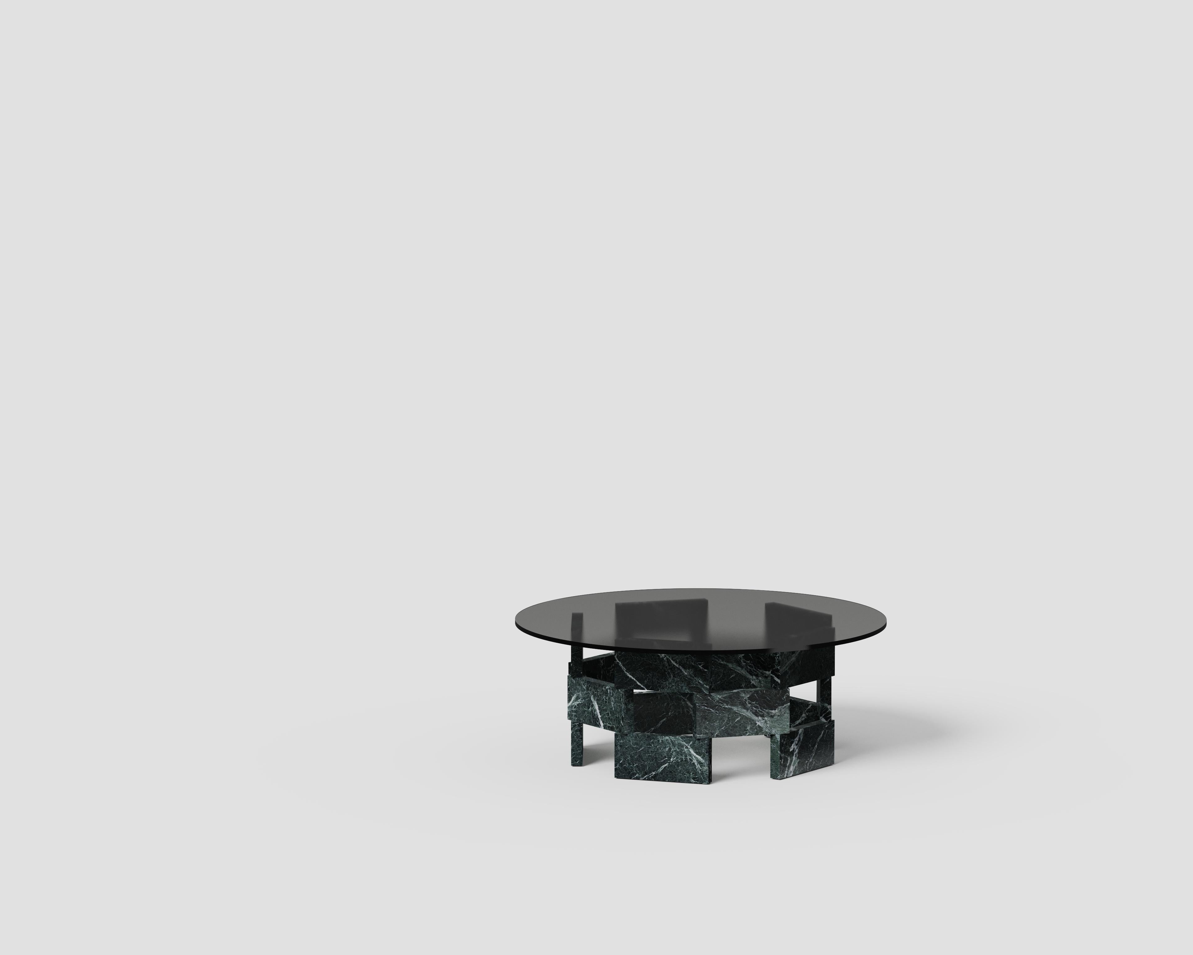 Opus Mod 4 Marble, Extrawhite Glass And Metal Low Table by Antonio De Marco
Dimensions: Ø 130 x H 38 cm. 
Materials: Verde Notte marble, metal, and glass.

Available in different material options. Please contact us.

OPUS is a modular system of