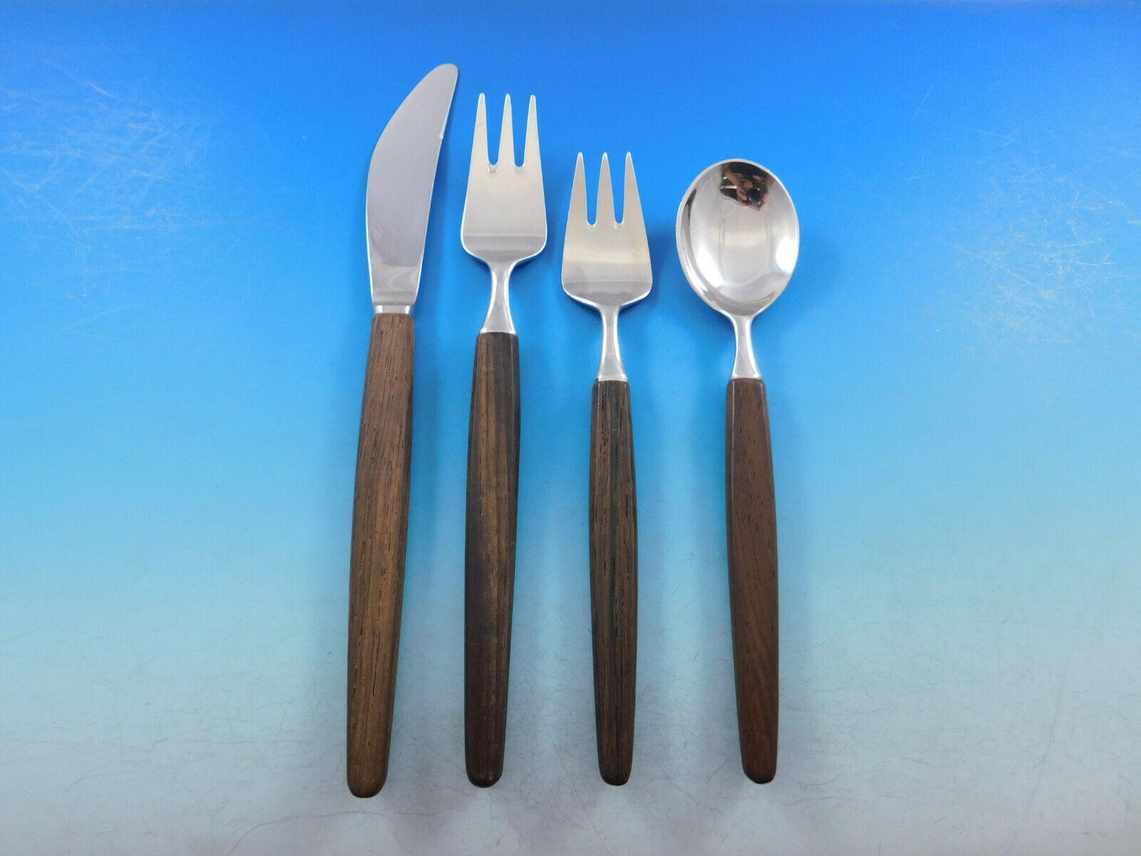 Mid-Century Modern Opus Rosewood Lundtofte Denmark Stainless Steel Flatware set, 50 pieces. This set includes:

10 Knives, 9