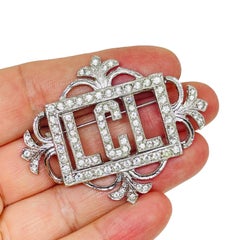 ORA signed vintage silver tone rhinestones designer brooch