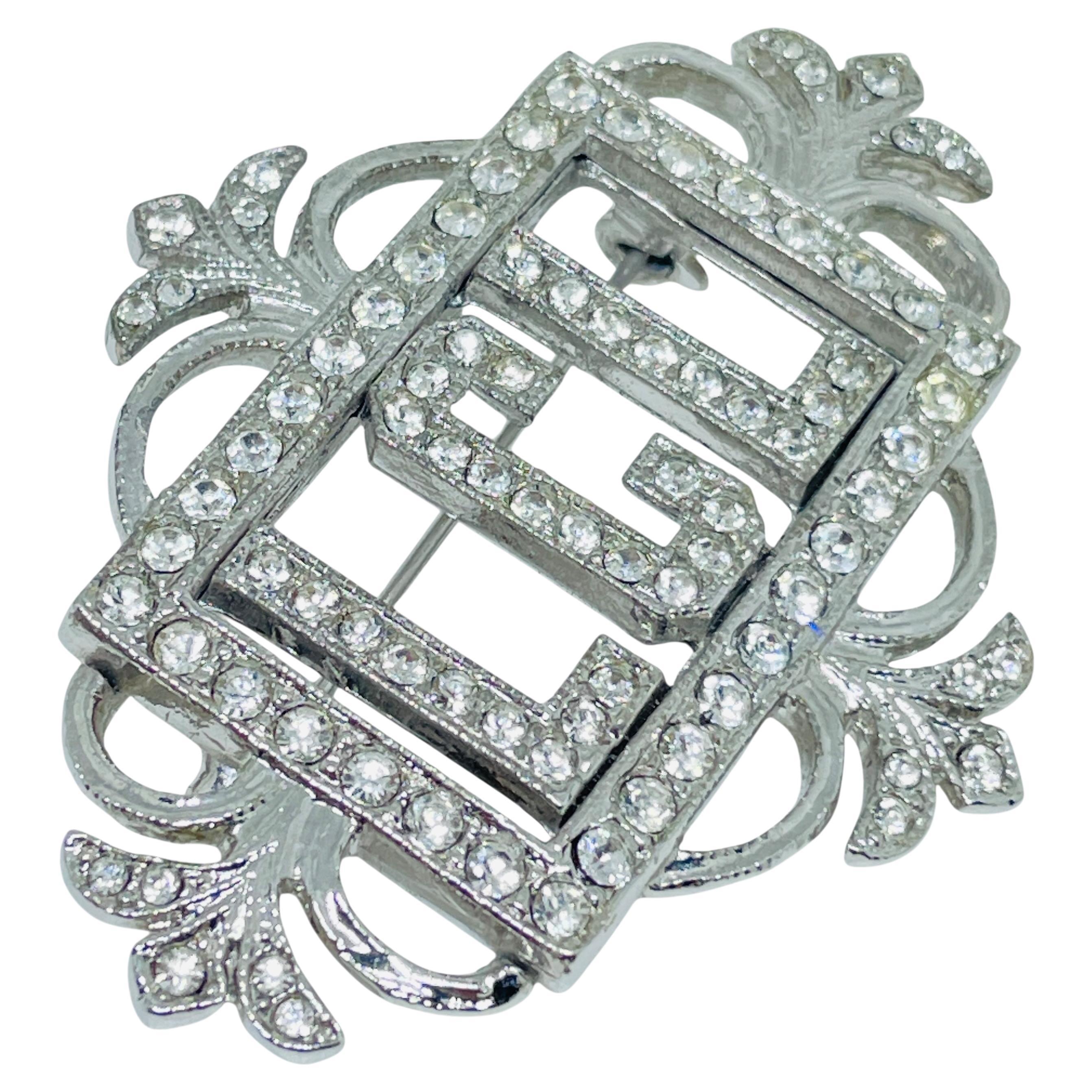 Broche de diseño vintage de strass en tono plateado firmado por ORA