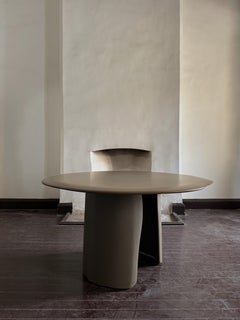 Contemporary Sculpted Organic Leg Round Top Brown Wood Table by kar