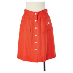 Orange acetate A Line skirt with white snaps middle front Courrèges 
