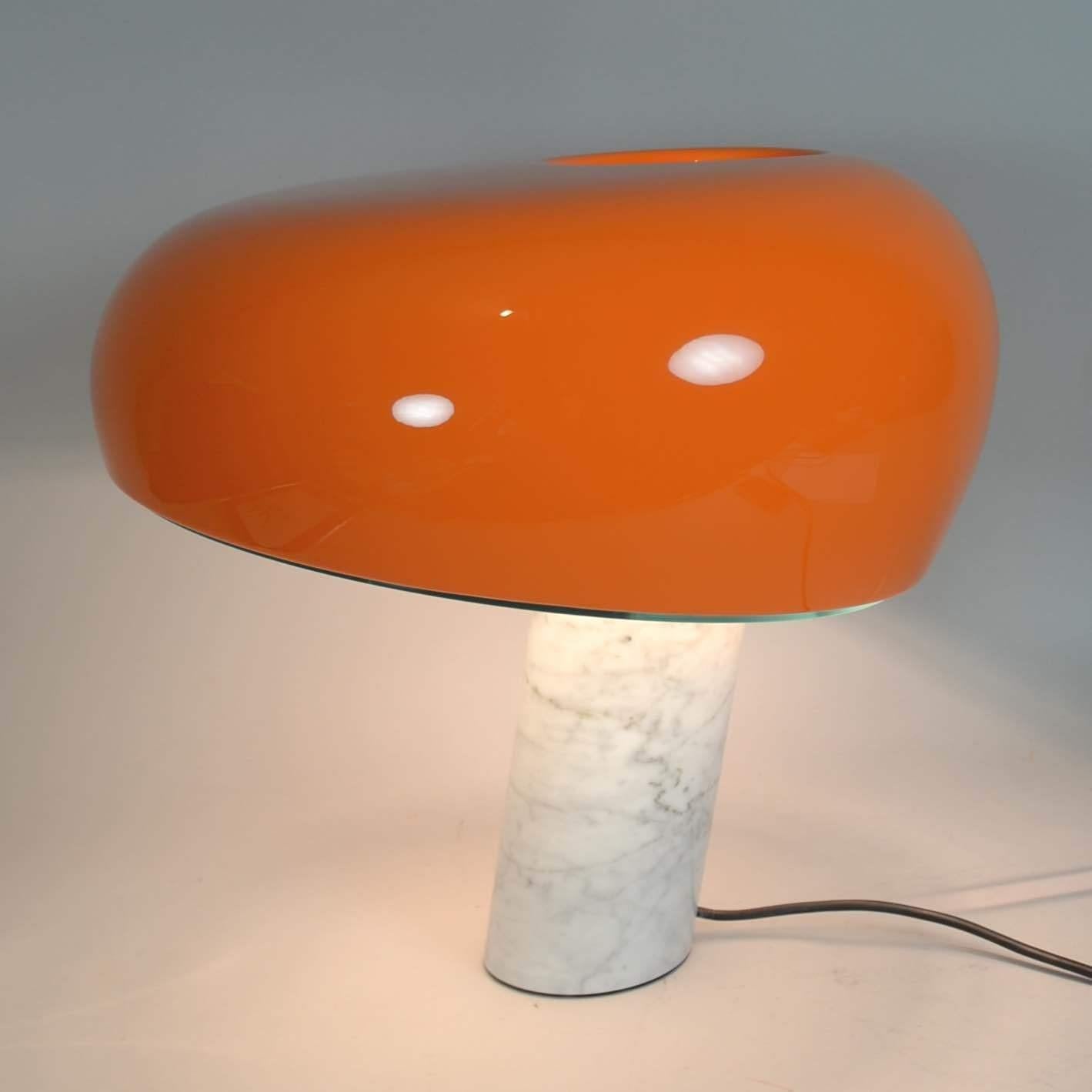 Achille & Pier Giacomo Castiglioni Snoopy table lamp. Dimmer operated lamp from 1967, with marble base and enameled metal shade. Up to 150 watts E27 socket.

This design from 1967 takes its light-hearted shape and name from the beloved cartoon