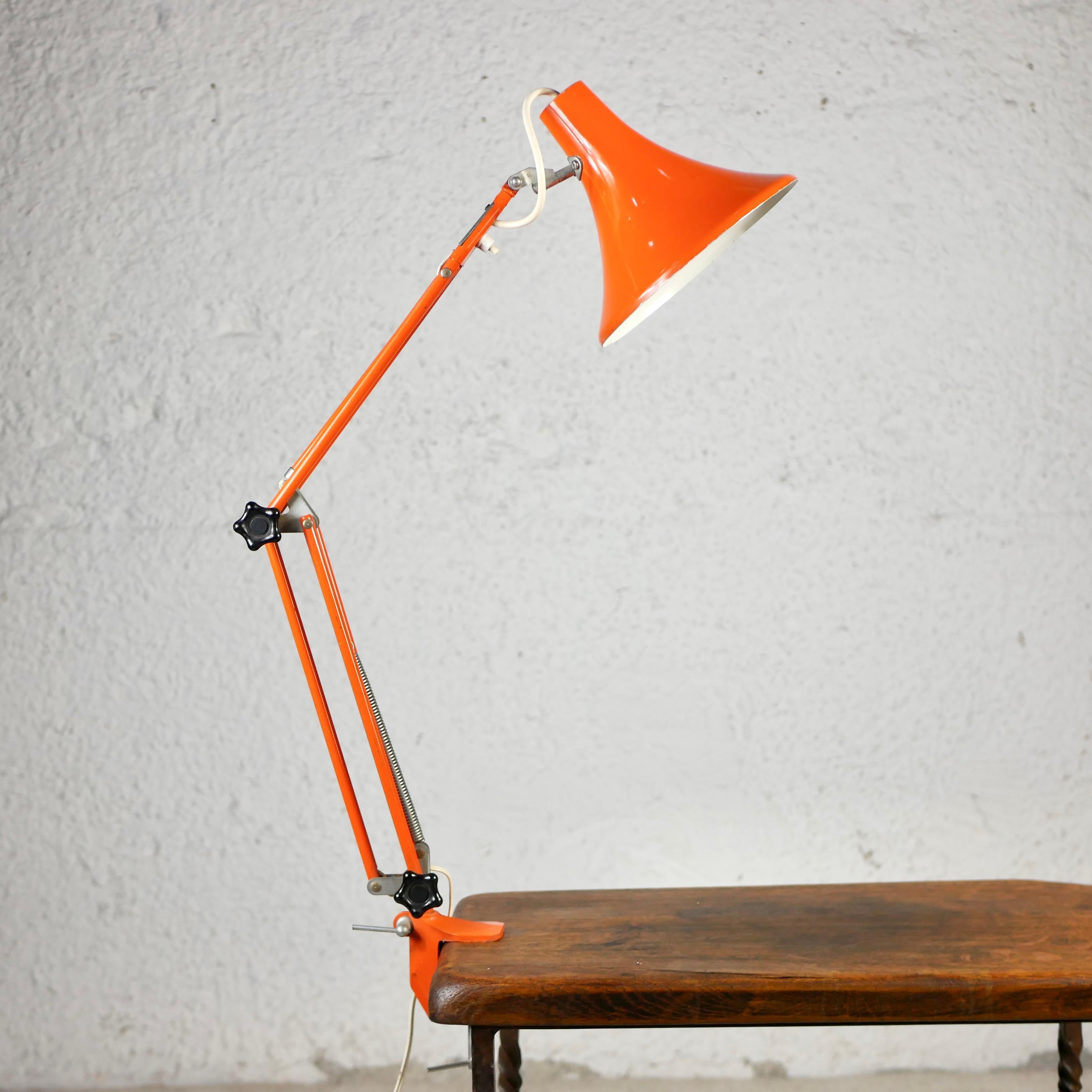 Beautiful orange desklamp from France, made in the 1970s.
Adjustable and orientable, very practical and fun.
Dimensions : approx H71, lampshade D20 W18
Good condition, light scratches