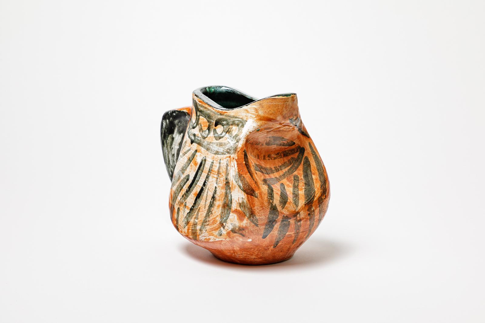 Beaux Arts Orange and black glazed ceramic pitcher, circa 1950-1960. For Sale