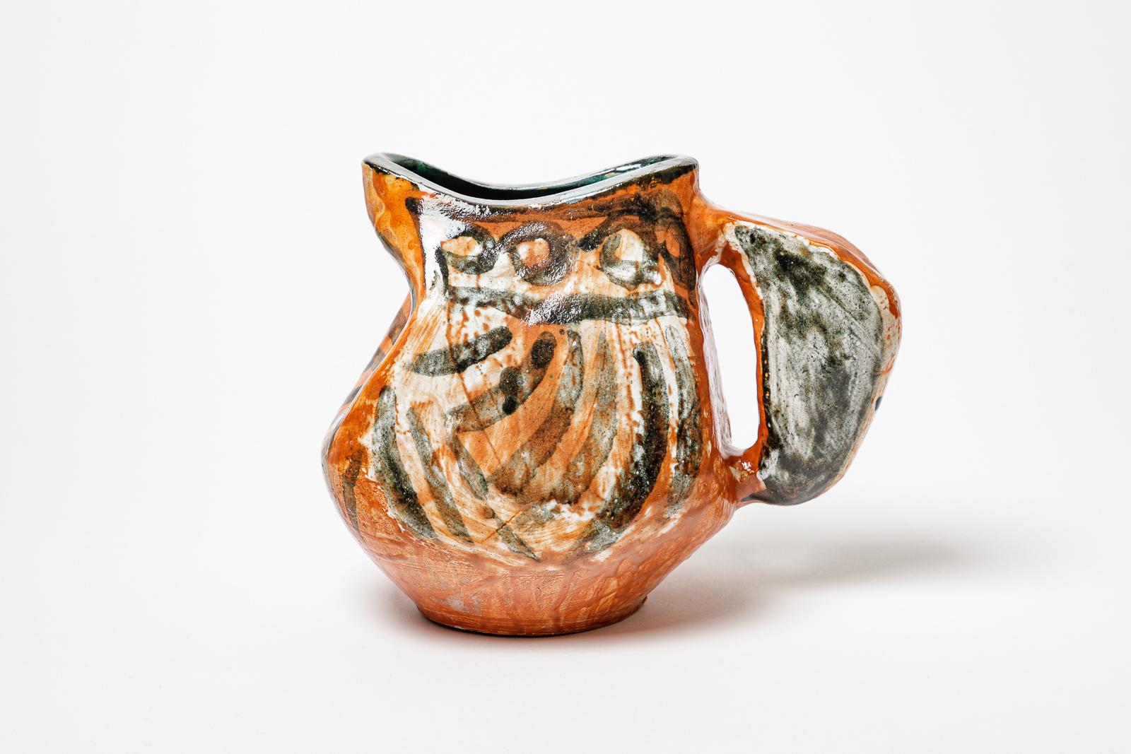 Orange and black glazed ceramic pitcher, circa 1950-1960. In Good Condition For Sale In Saint-Ouen, FR