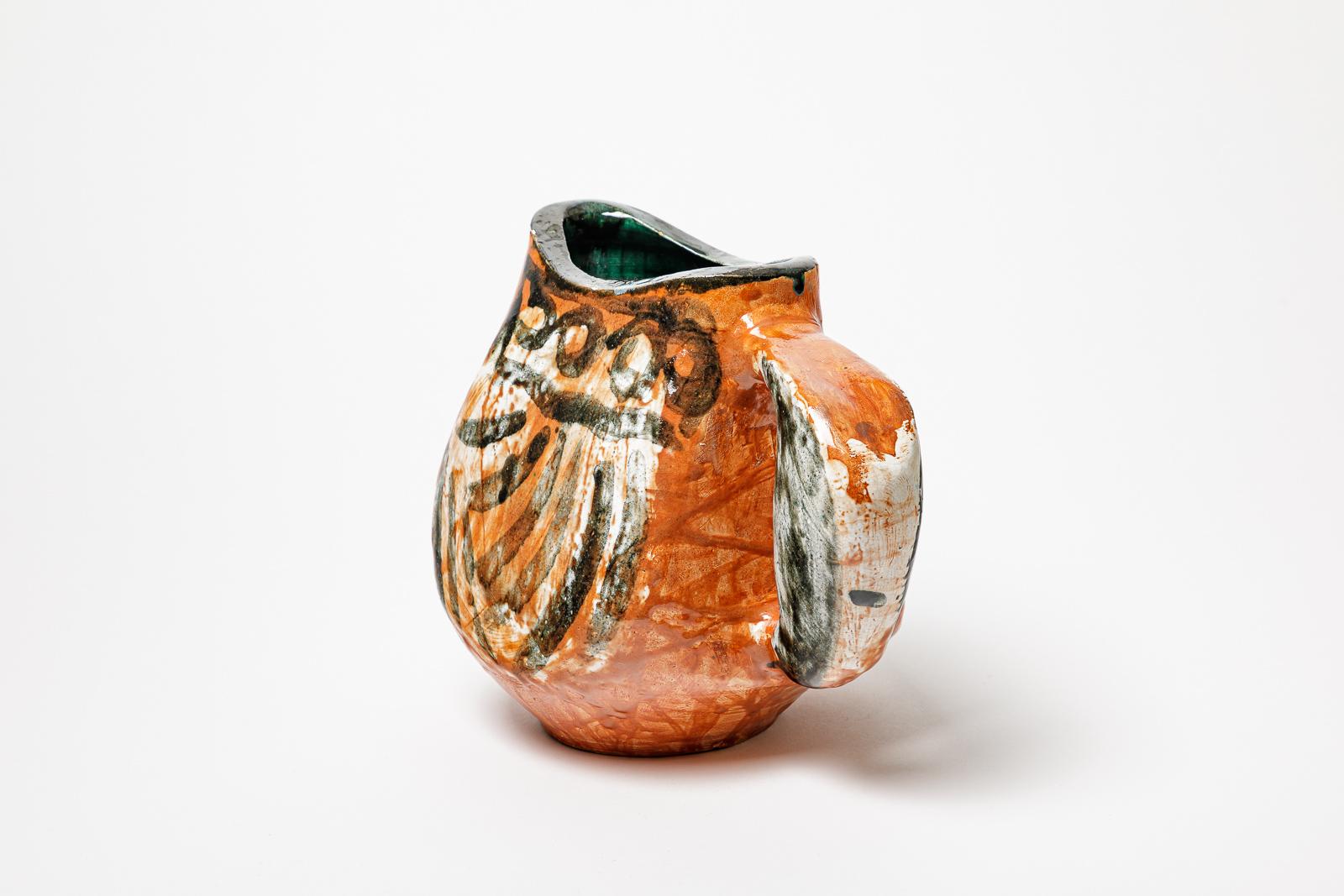 Mid-20th Century Orange and black glazed ceramic pitcher, circa 1950-1960. For Sale
