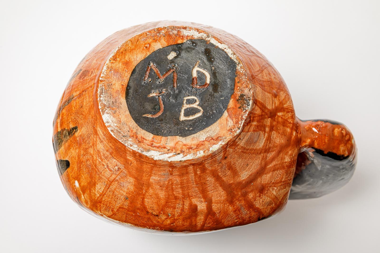 Orange and black glazed ceramic pitcher, circa 1950-1960. For Sale 1