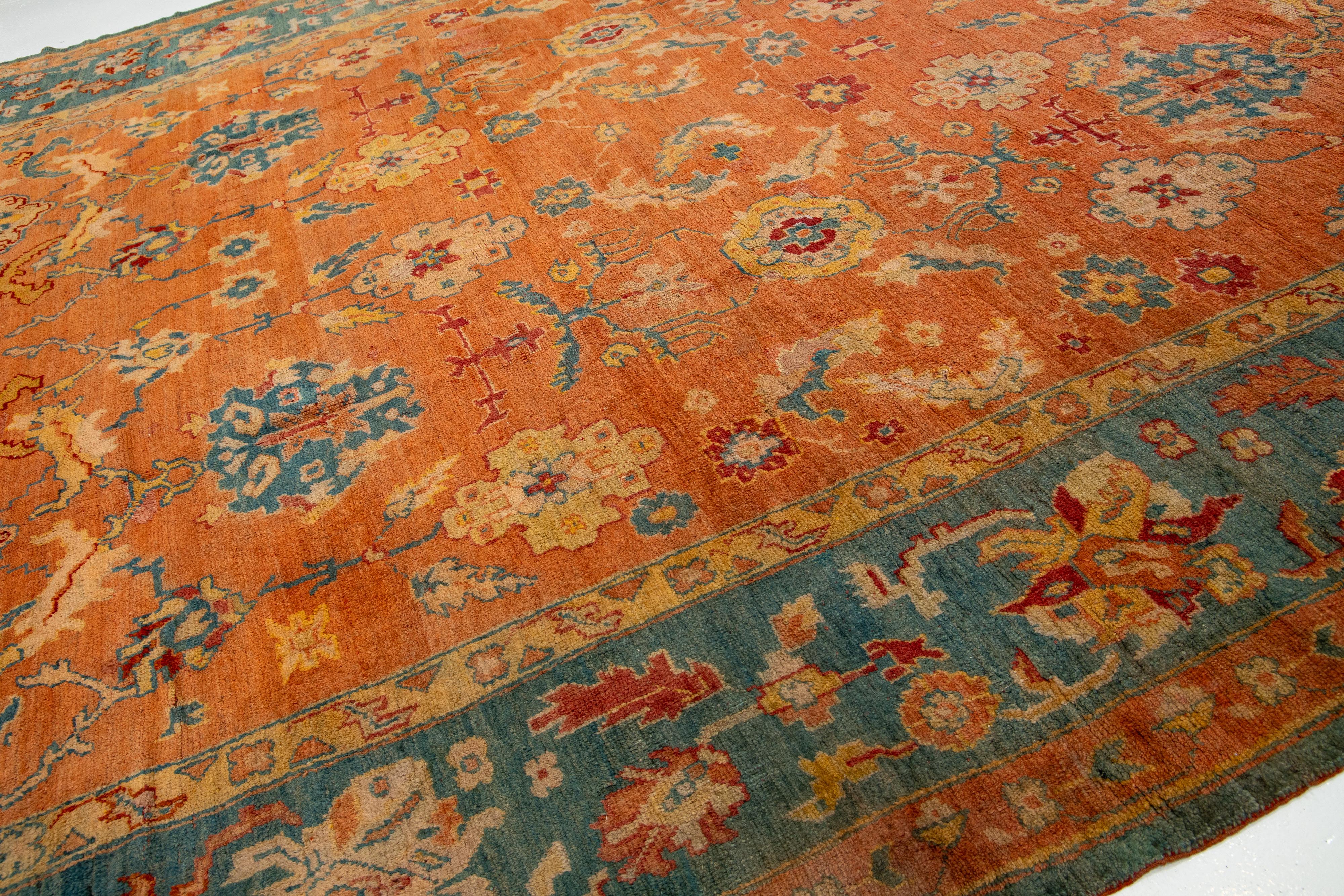 Hand-Knotted Orange and Blue Antique Turkish Oushak Wool Rug Handmade From the 1880s For Sale