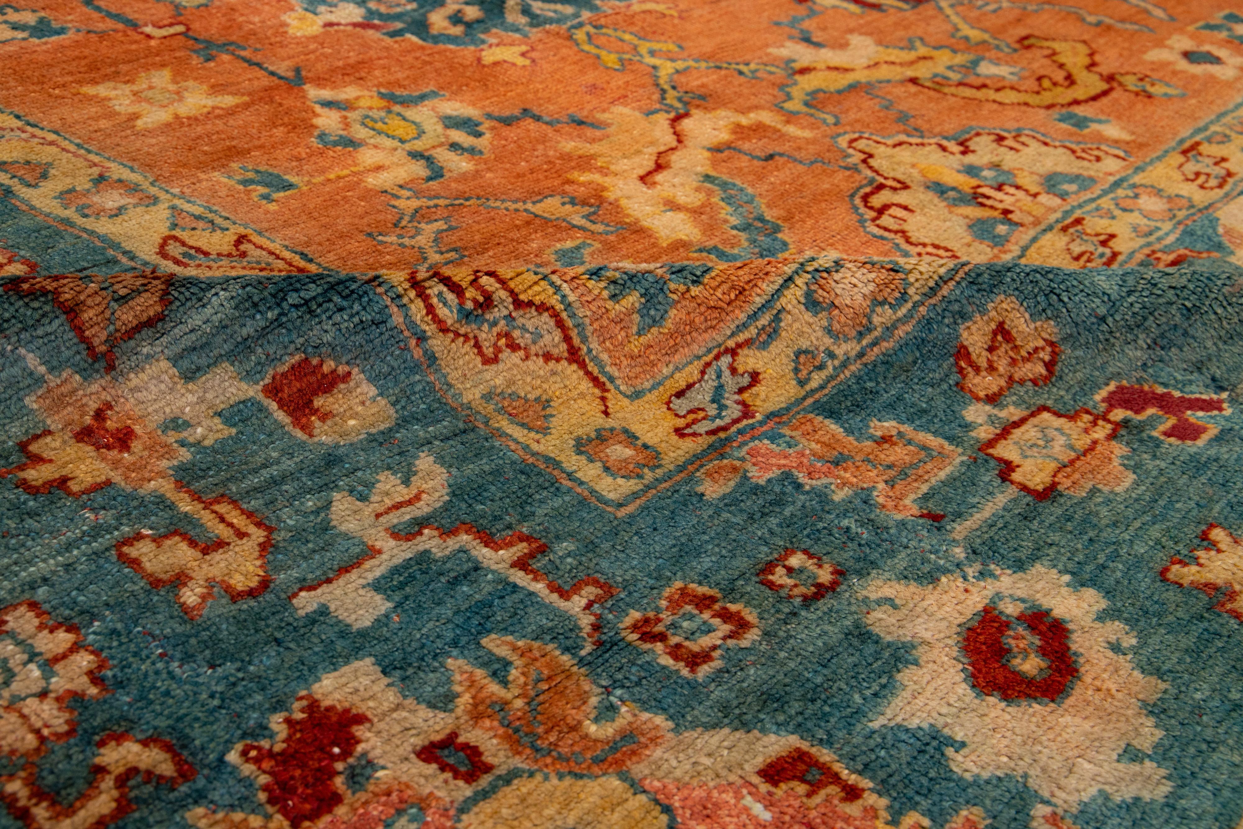 Tapis turc ancien en laine d'Oushak orange et bleu fabriqué à la main dans les années 1880 en vente 1
