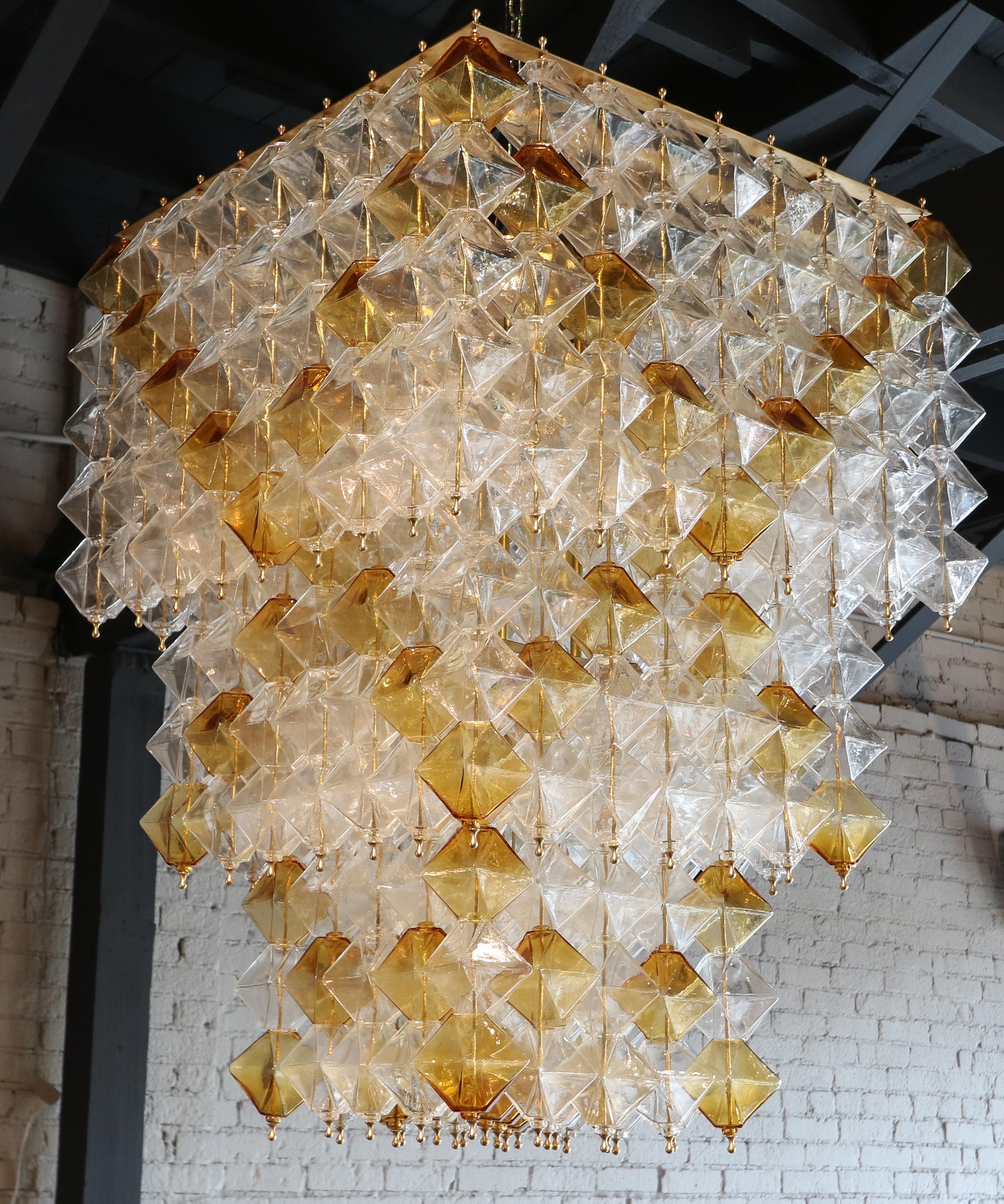 Mid-Century Modern Orange and Clear Murano Glass Tiered Chandelier For Sale