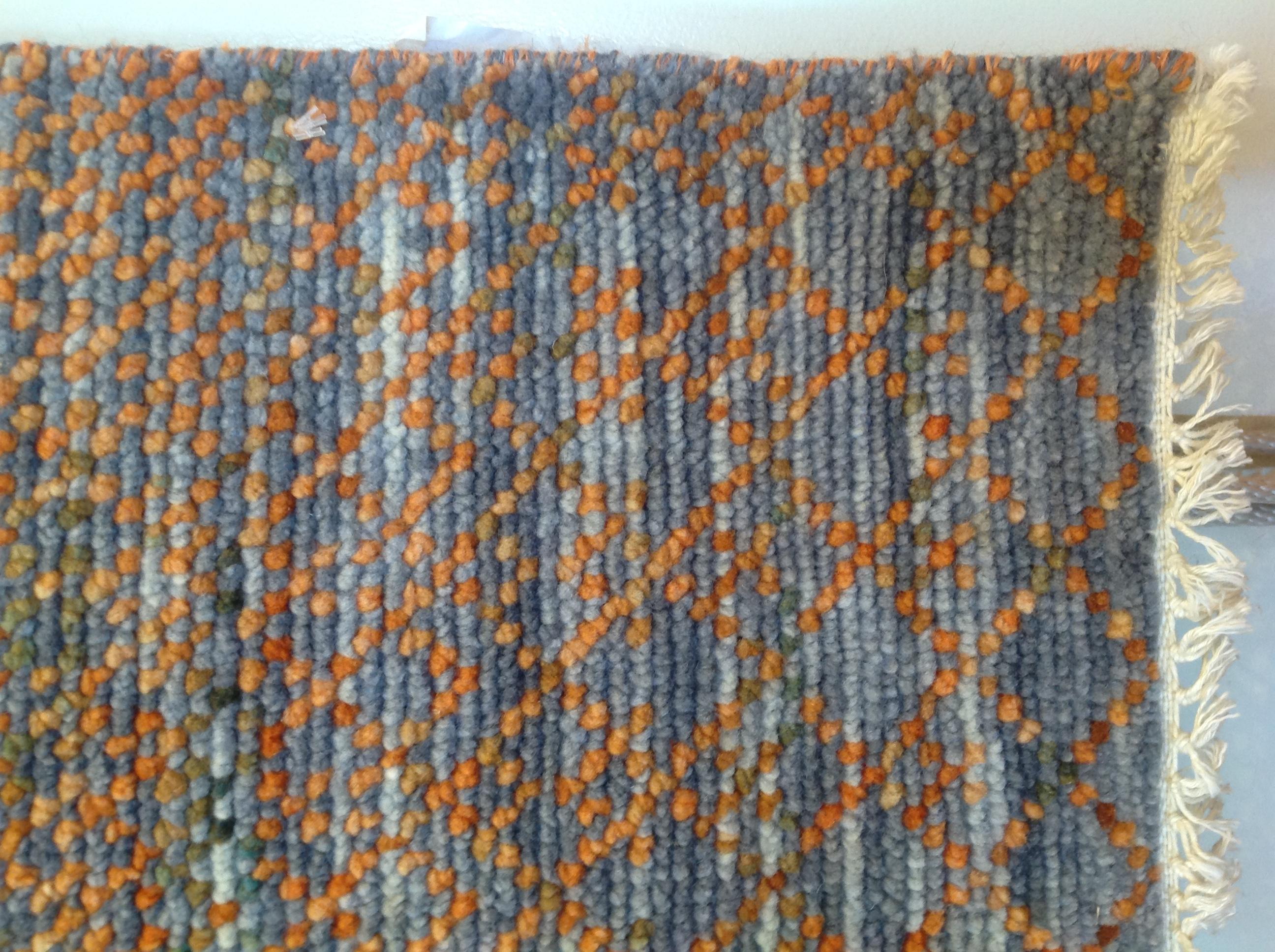 orange and grey rugs