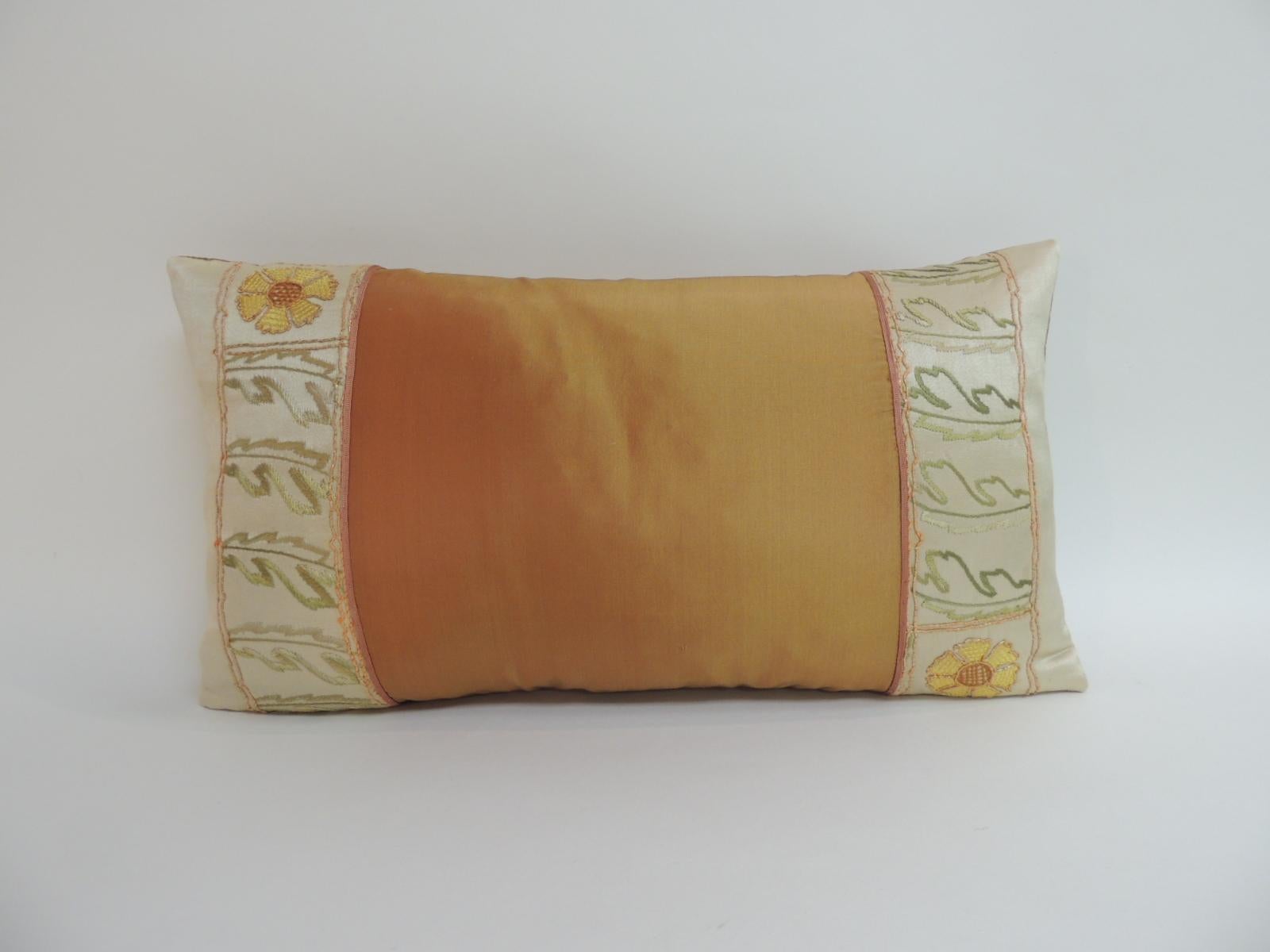 Orange Turkish embroidered silk-on-silk decorative pillow with accents of gold metallic threads in the floral embroidery. 
Orange silk inset panel and backing. Throw pillow embellished with a small flat silk decorative trim at the seams.

