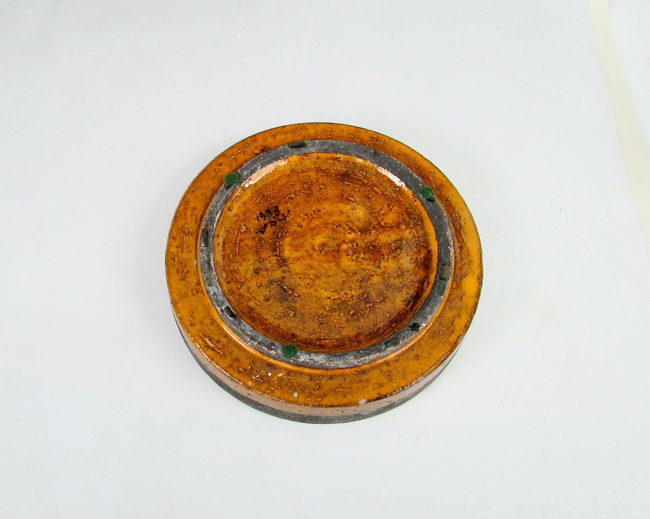 Orange and red round Italian pottery ashtray with chip For Sale 3