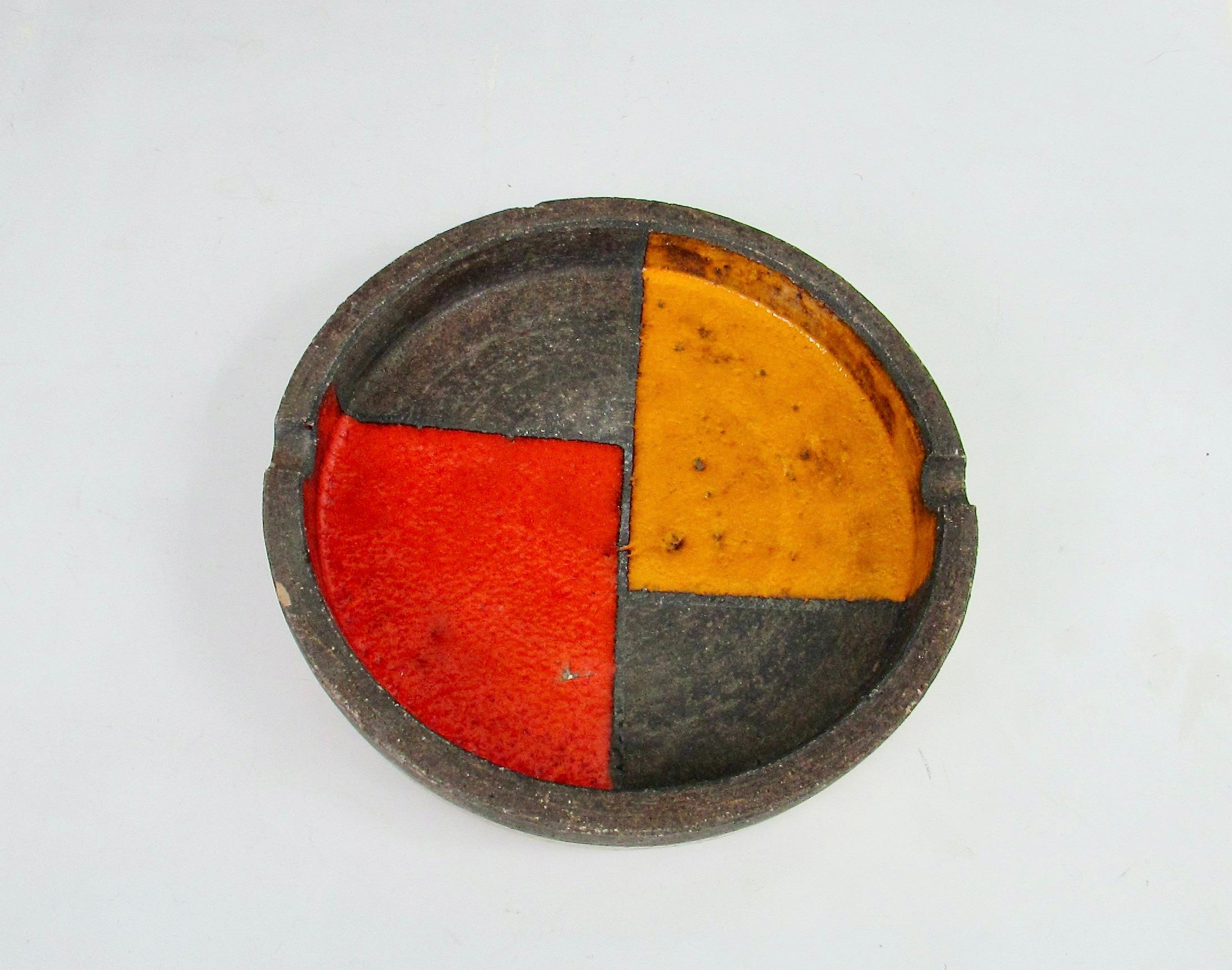 Pottery Orange and red round Italian pottery ashtray with chip For Sale