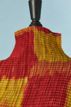 Orange and yellow pleated taÏ&daÏ long sleeve top Issey Miyake