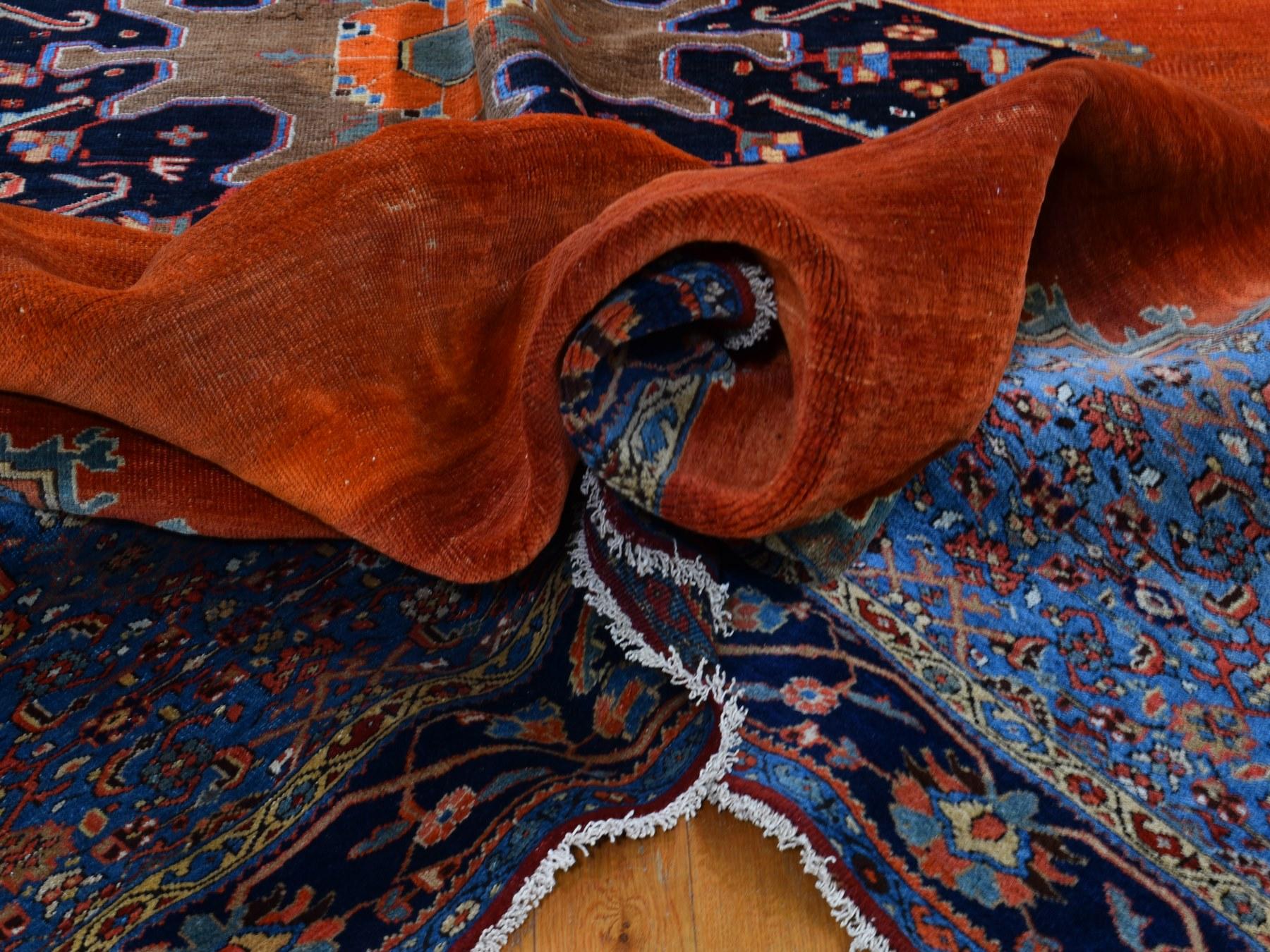 Early 20th Century Orange Antique and Worn Persian Afshar Open Filed with Medallion Hand Knotted