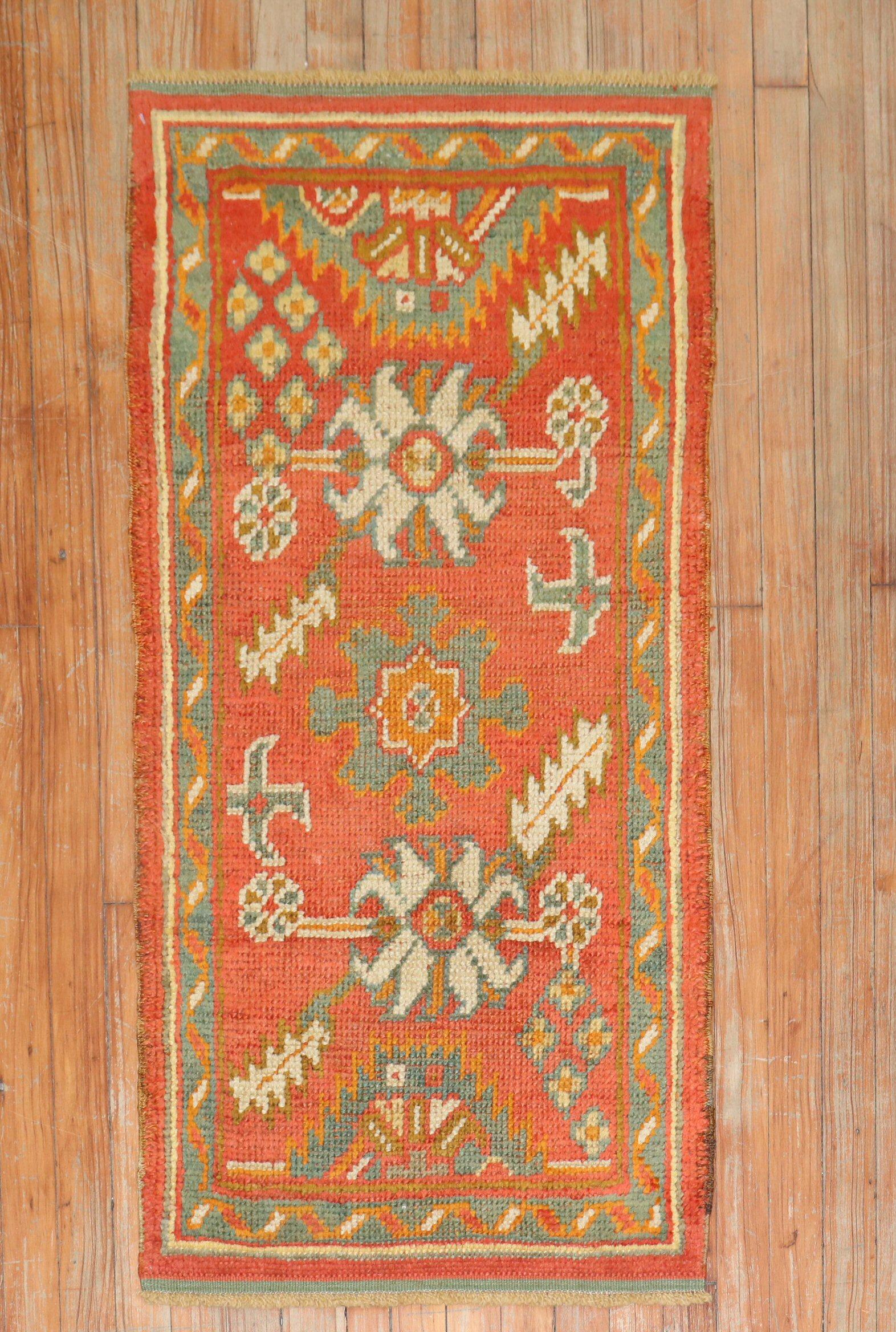 An early 20th-century orange color antique turkish oushak scatter throw size rug

Measures: 2' x 4'1”.