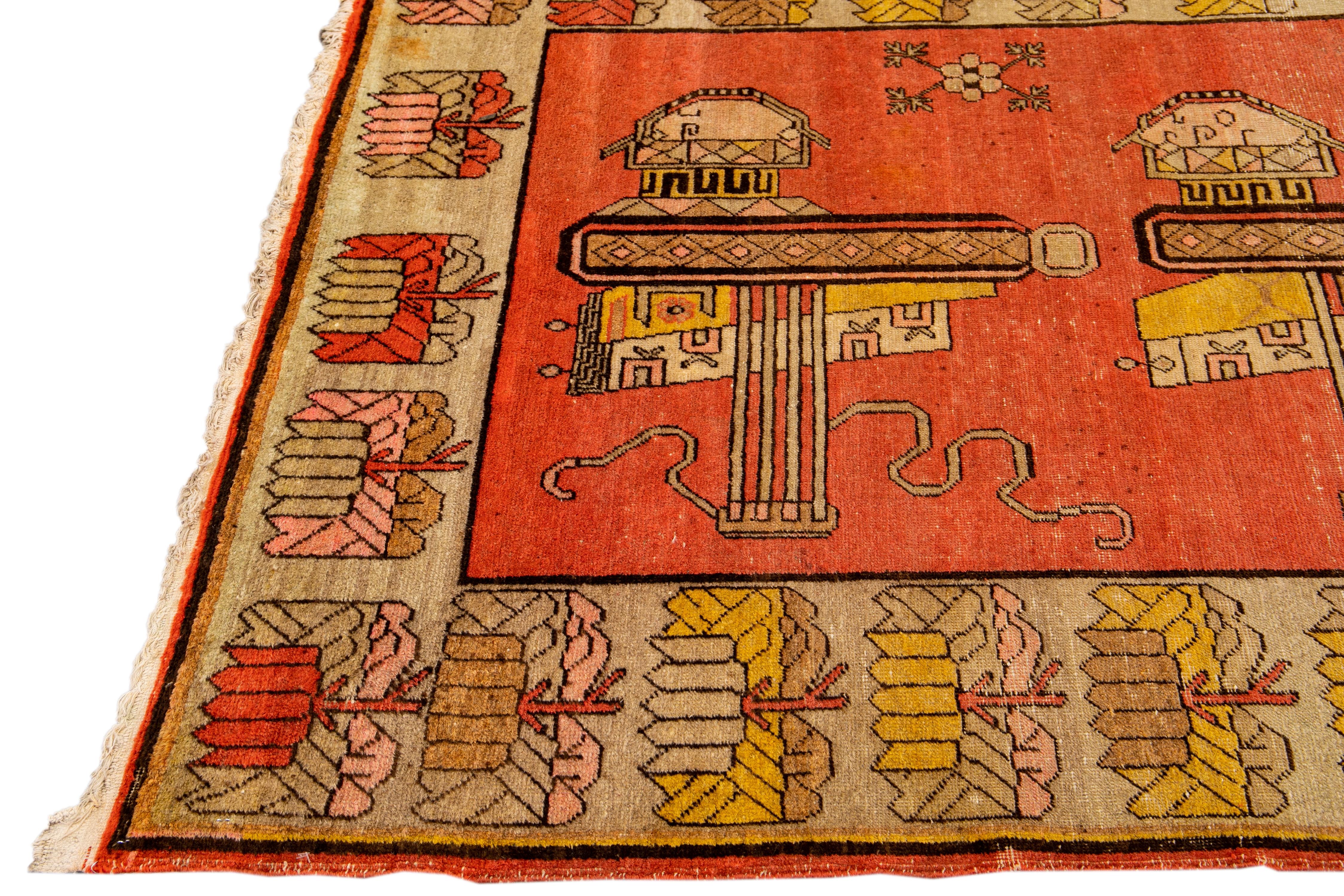 Alfombra de lana con motivos pictóricos naranja antigua de Samarcanda hecha a mano Azerbaiyano en venta