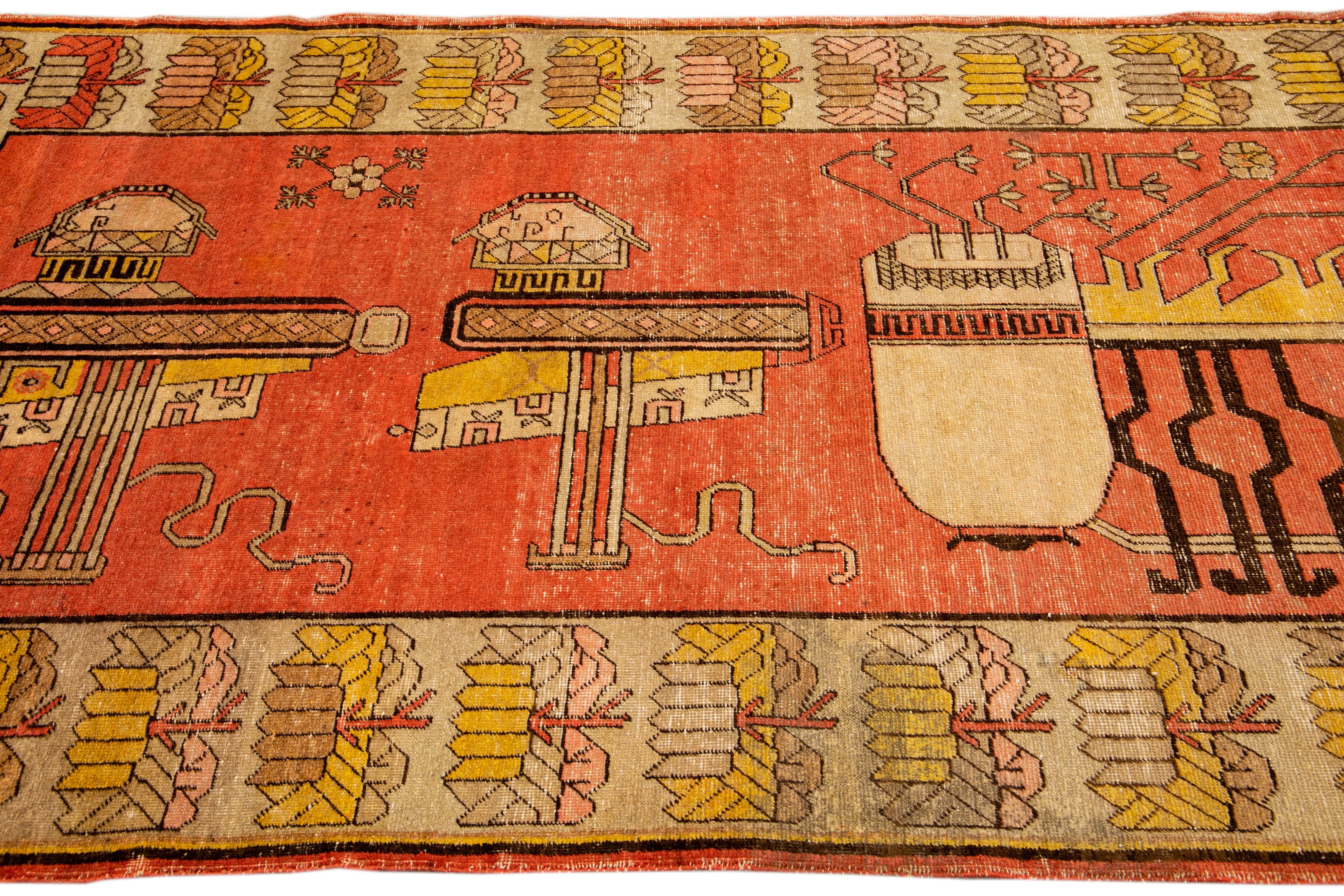 Alfombra de lana con motivos pictóricos naranja antigua de Samarcanda hecha a mano siglo XX en venta