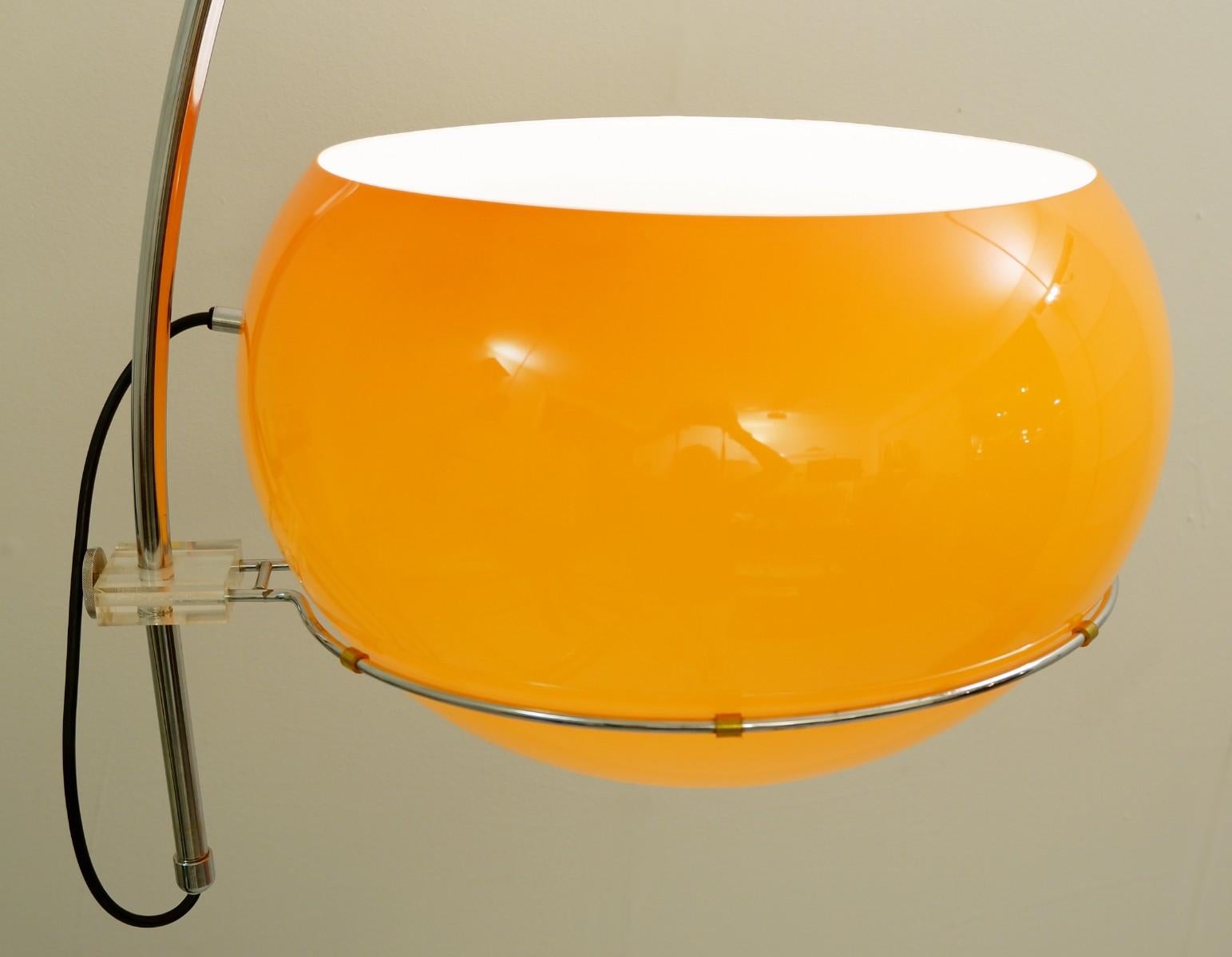 Orange arc floor lamp.