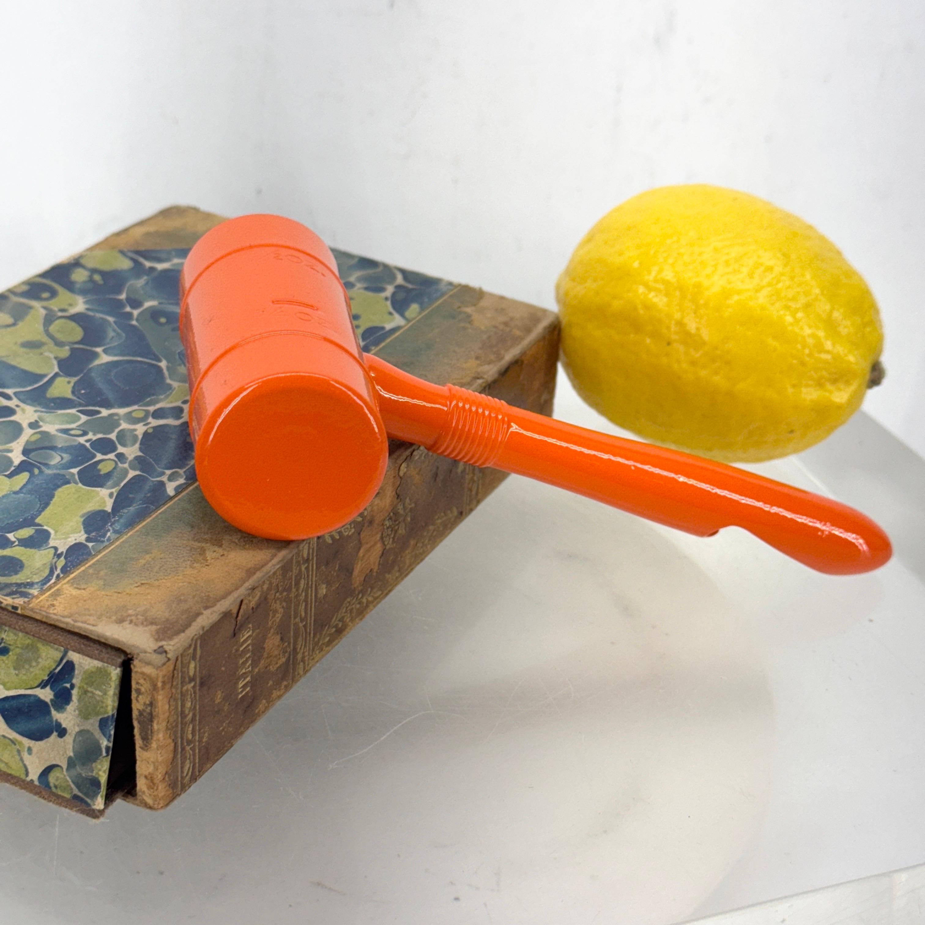 Charming Chase measuring tool from the 1930's. This one of a kind price has been powder coated in a bright shape of orange. Great addition to any bar.
This piece gages in ounces, 2 oz, 1.5oz, 1 oz and 3/4 oz.
Chase Metal Works, founded as a