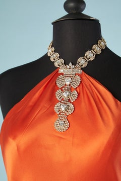 Orange backless evening dress with rhinestone neckless