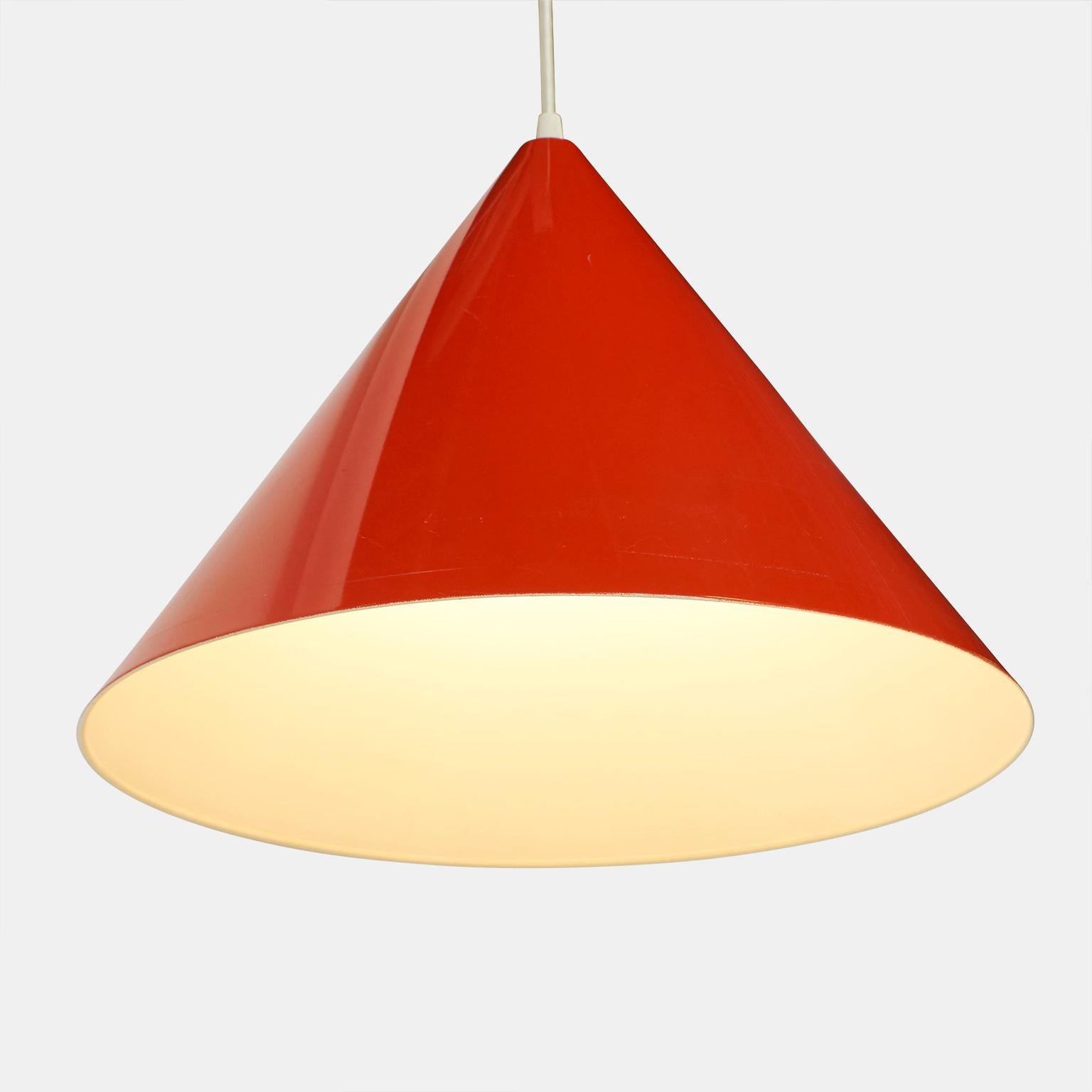 A single billiards lamp with an enameled orange conical metal shade by Louis Poulsen. Rewired with white cloth cord.