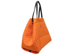 Sac fourre-tout MM en néoprène gaufré Louis Vuitton, orange et noir