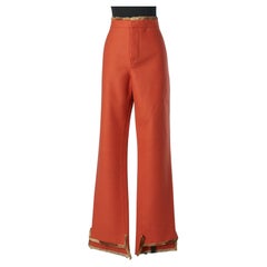 Orange boiled wool trouser with furs edge waist and bottom Fendi 