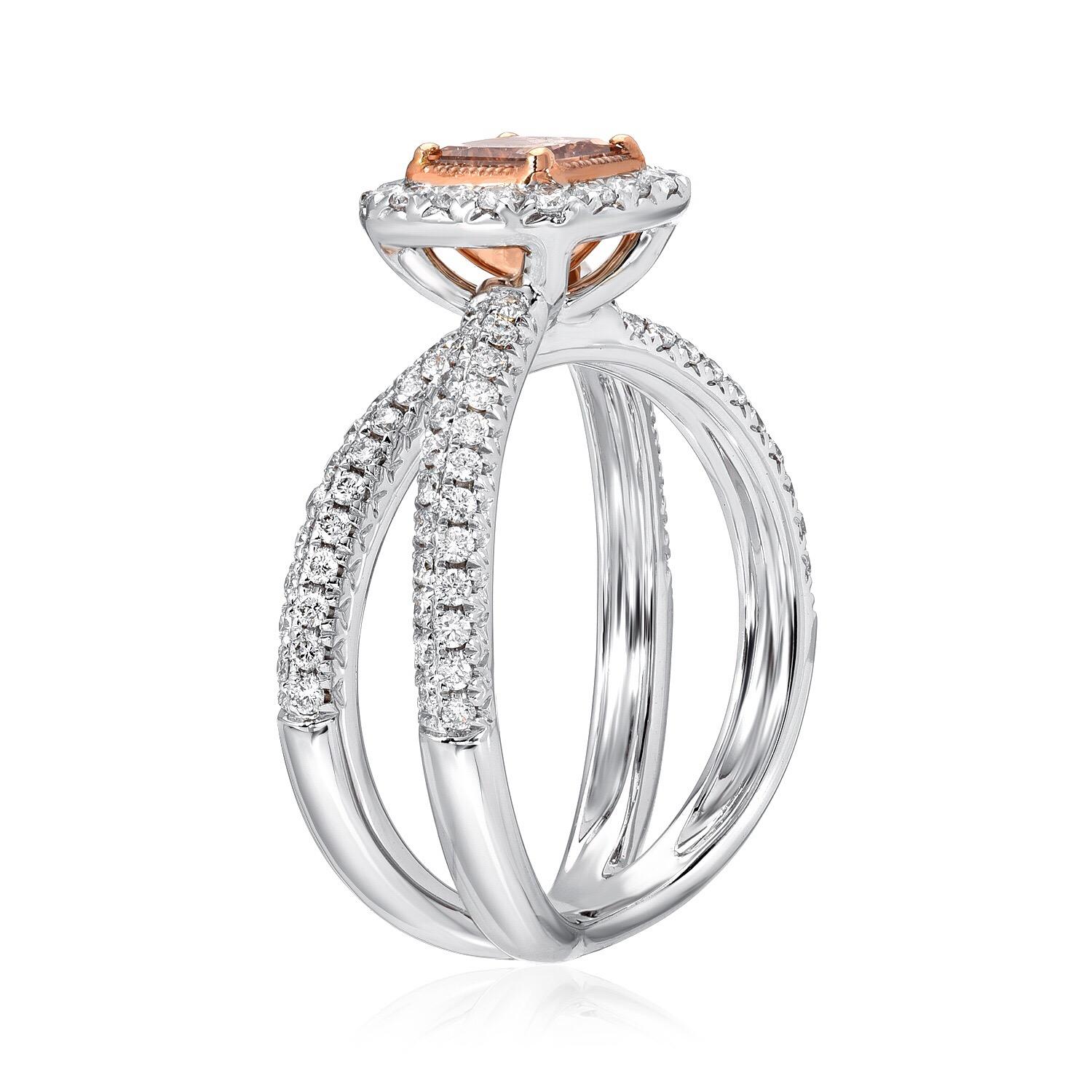 Fancy Orange Brown diamond ring, featuring a G.I.A certified 0.58 carat princess cut diamond, set in a criss cross round brilliant diamond setting weighing a total of 0.66 carats, to comprise this 18K white gold and rose gold ring.
The G.I.A